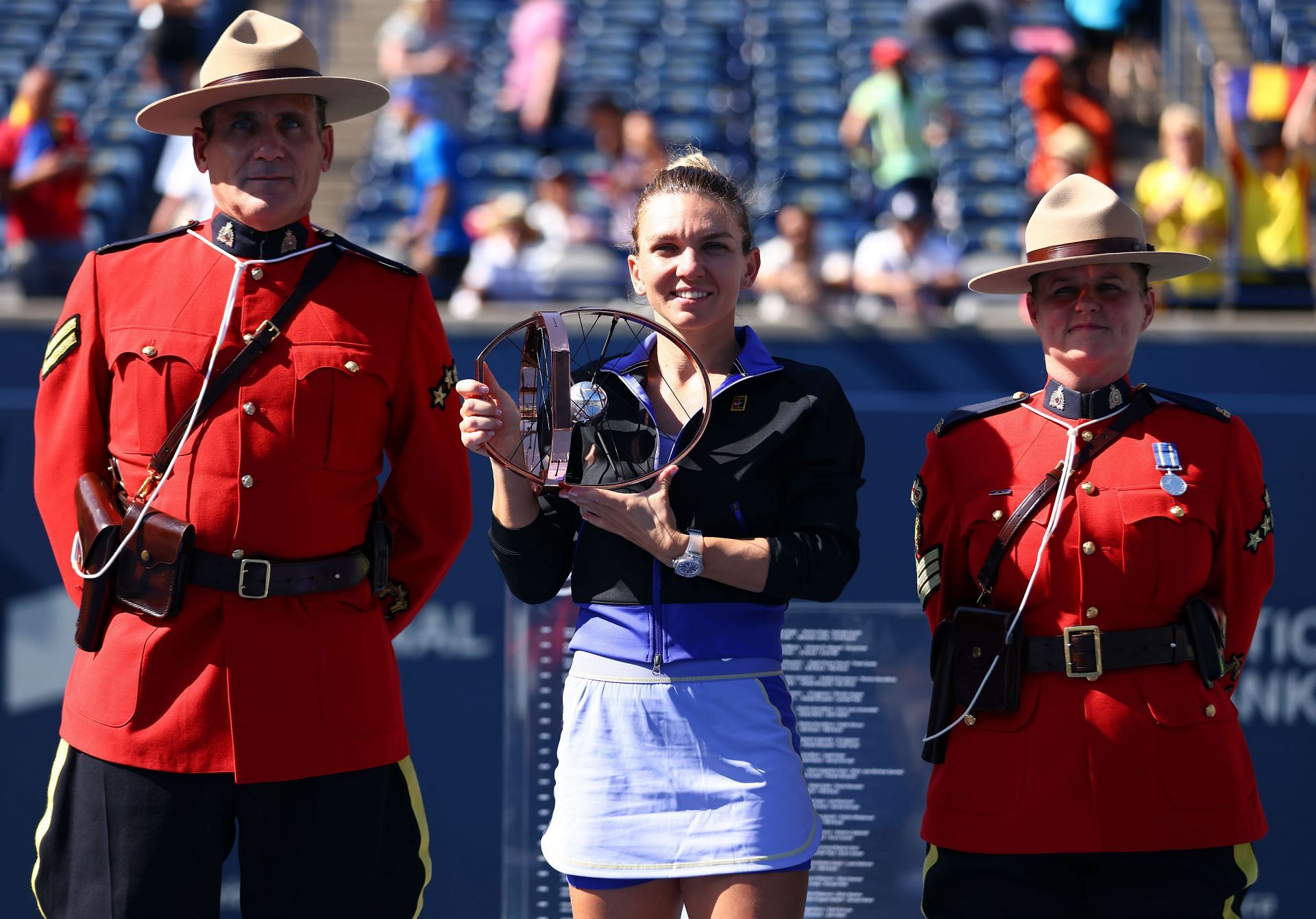 Halep with the National Bank Open trophy