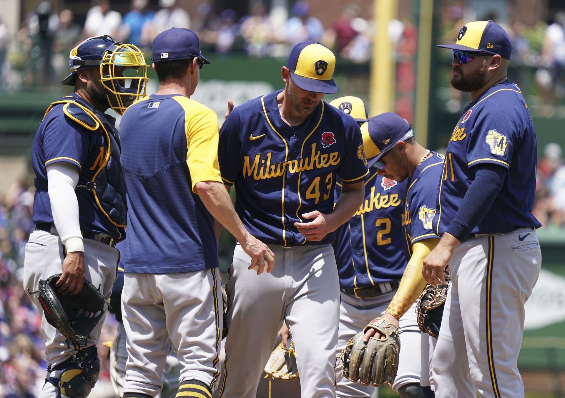 Manager Craig Counsell of the Milwaukee Brewers removes Ethan Small during the third inning.