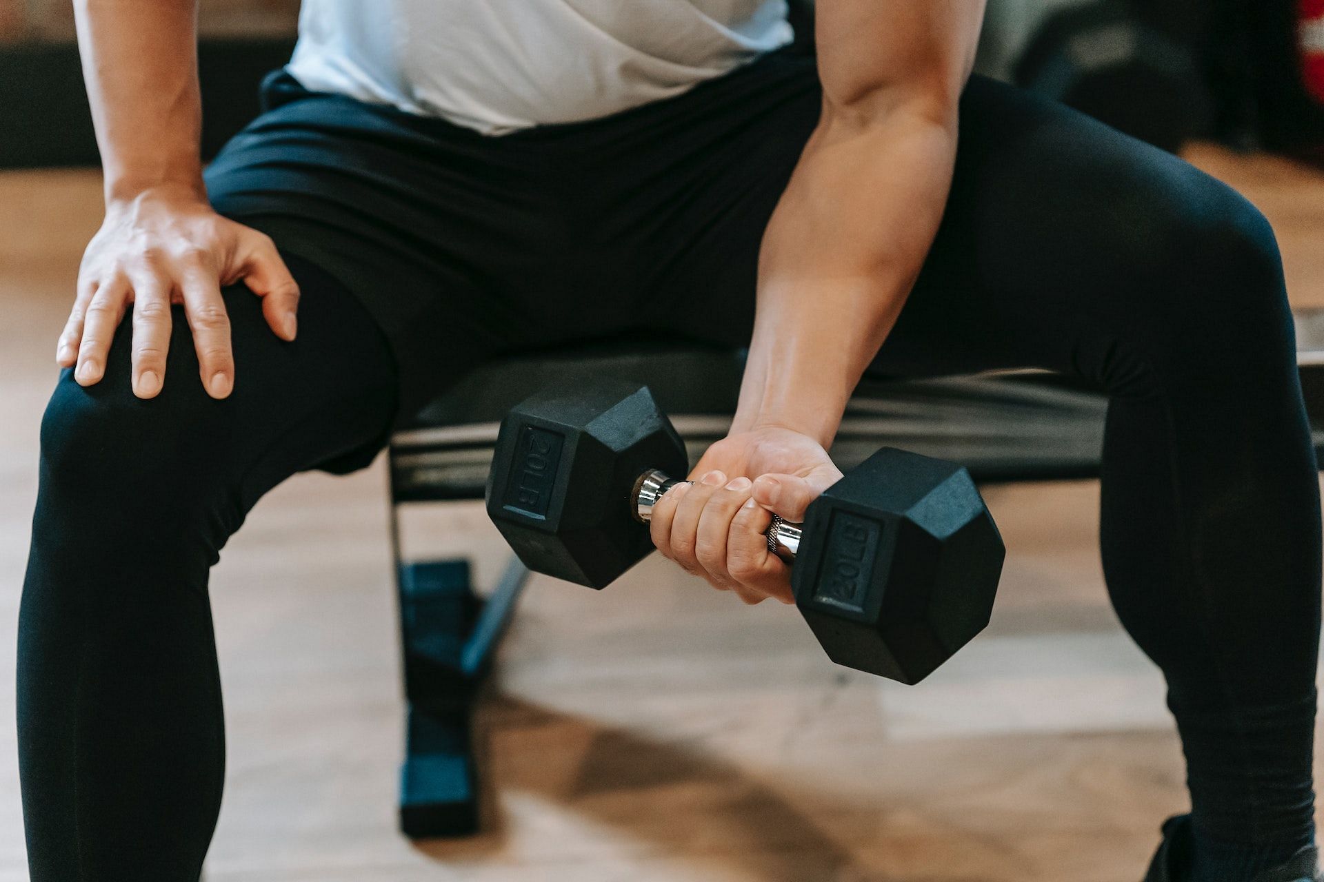 Arm-strengthening exercises improves muscle tone. (Photo via Pexels/Photo by Andres  Ayrton)