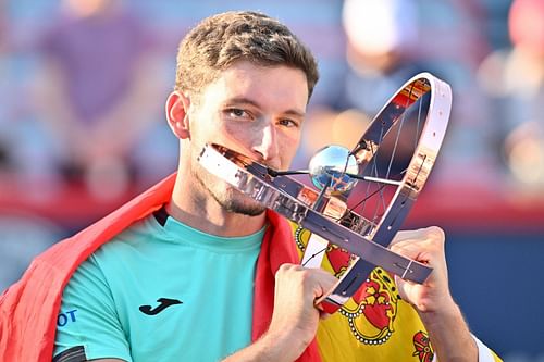 Pablo Carreno Busta celebrates his Canadian Open triumph.