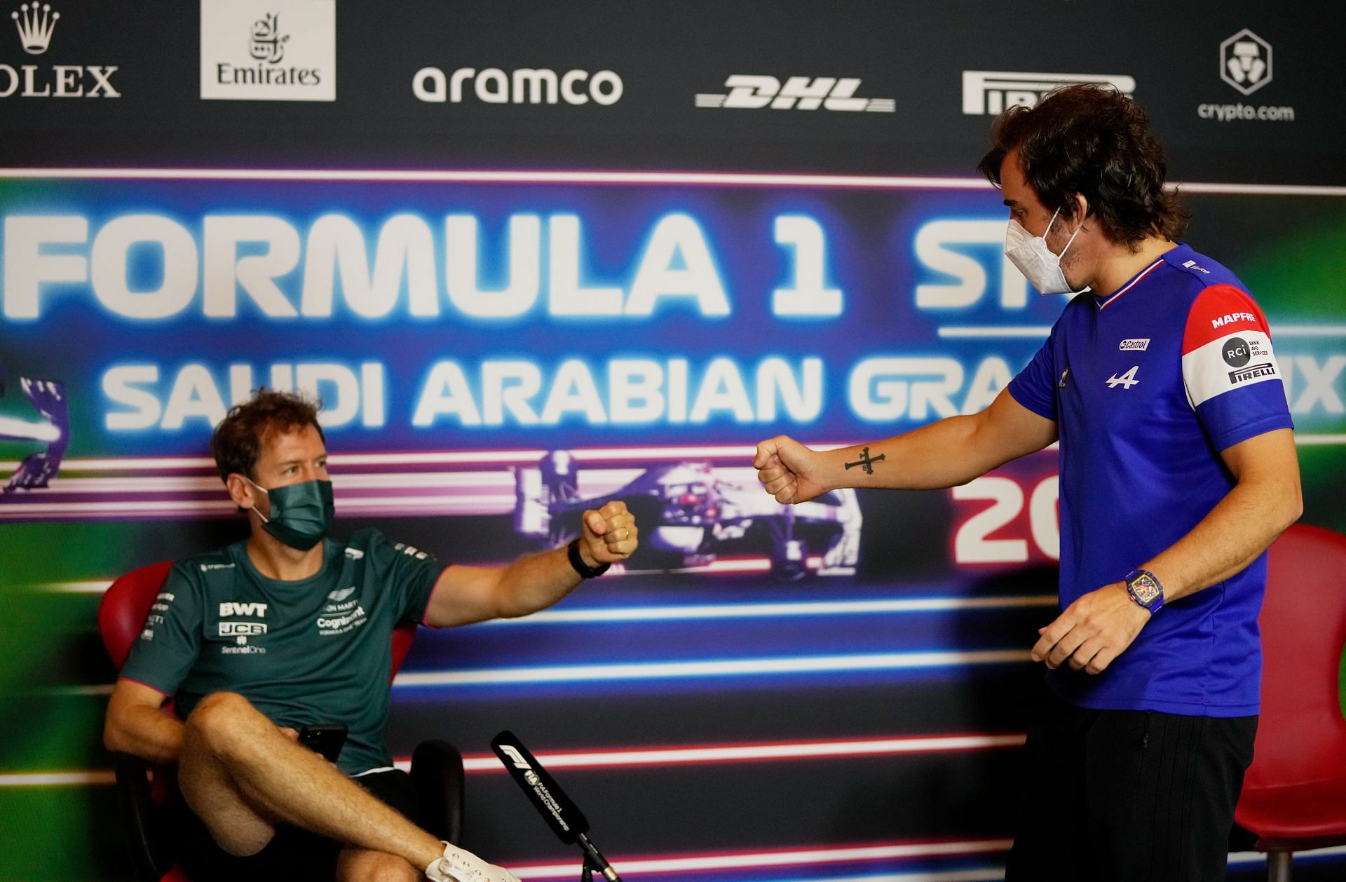 Sebastian Vettel (left) and Fernando Alonso (right) talk in the Drivers&#039; Press Conference during previews ahead of the F1 Grand Prix of Saudi Arabia at Jeddah Corniche Circuit on December 02, 2021, in Jeddah, Saudi Arabia (Photo by Hassan Ammar - Pool/Getty Images)