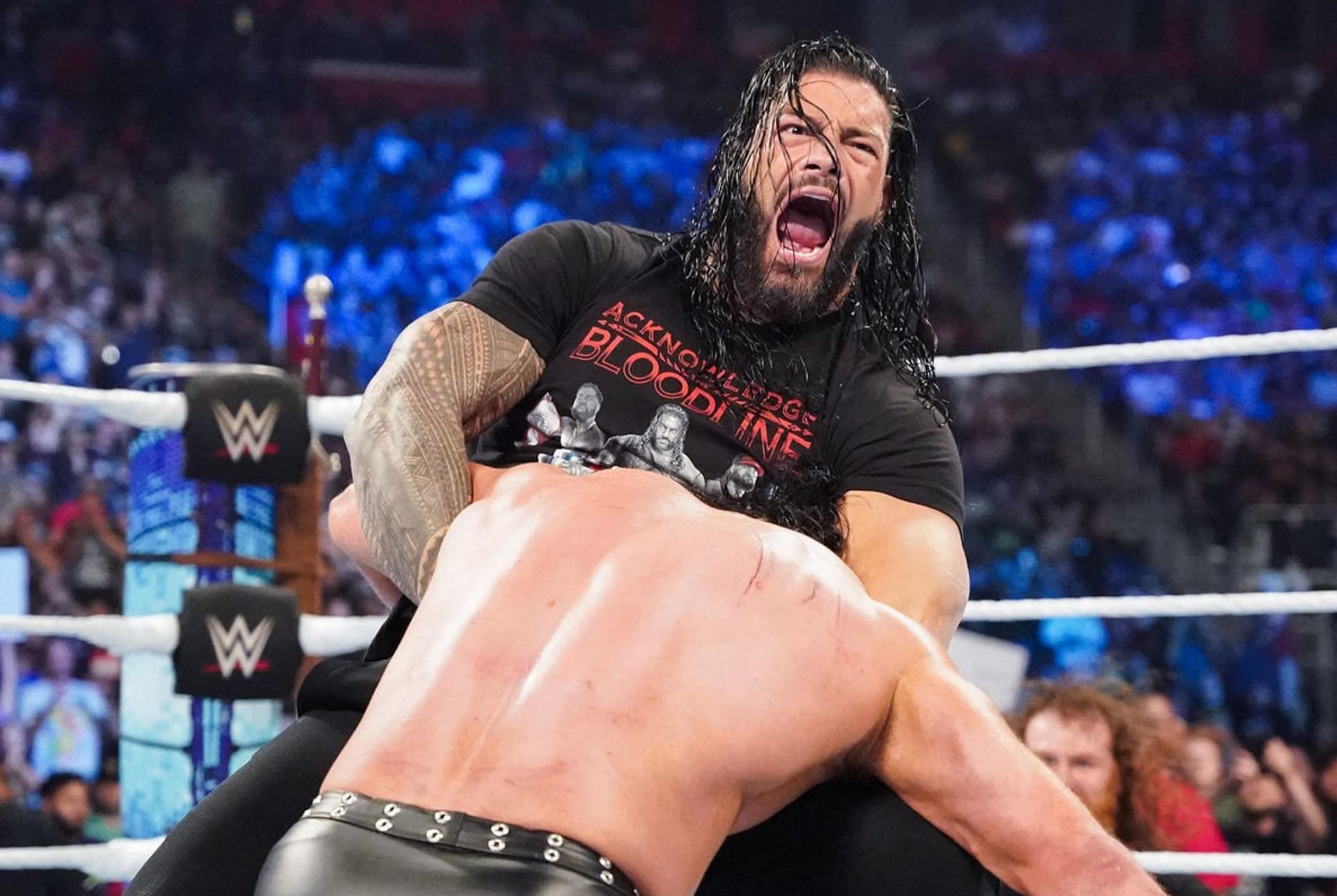 Roman Reigns caught Drew McIntyre in the Guillotine