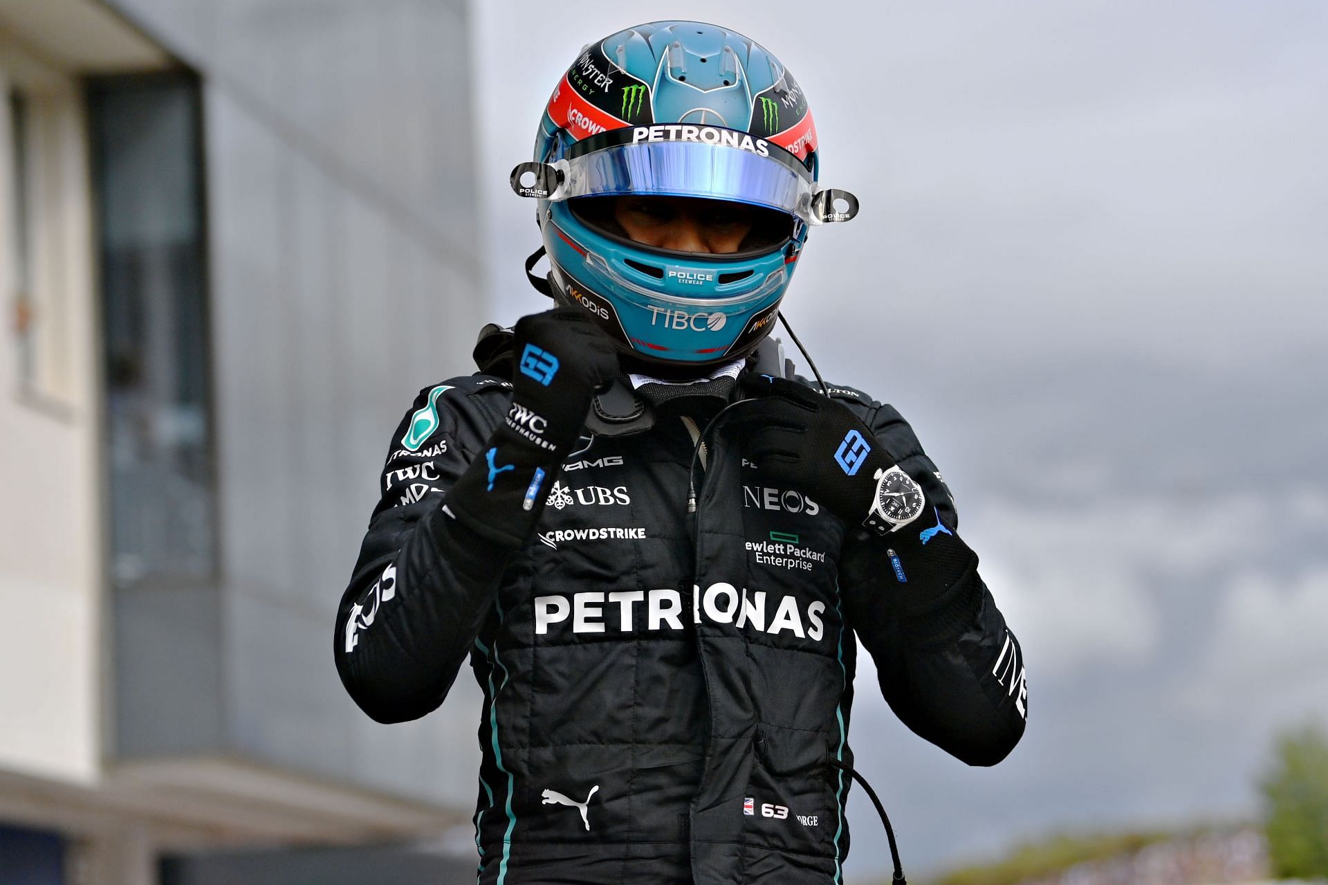 Mercedes driver George Russell celebrates after claiming pole at the 2022 F1 Hungarian GP weekend (Photo by Dan Mullan/Getty Images)
