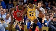 Magic Johnson, right, of the A Lakers posting up against Chicago Bulls' Michael Jordan.