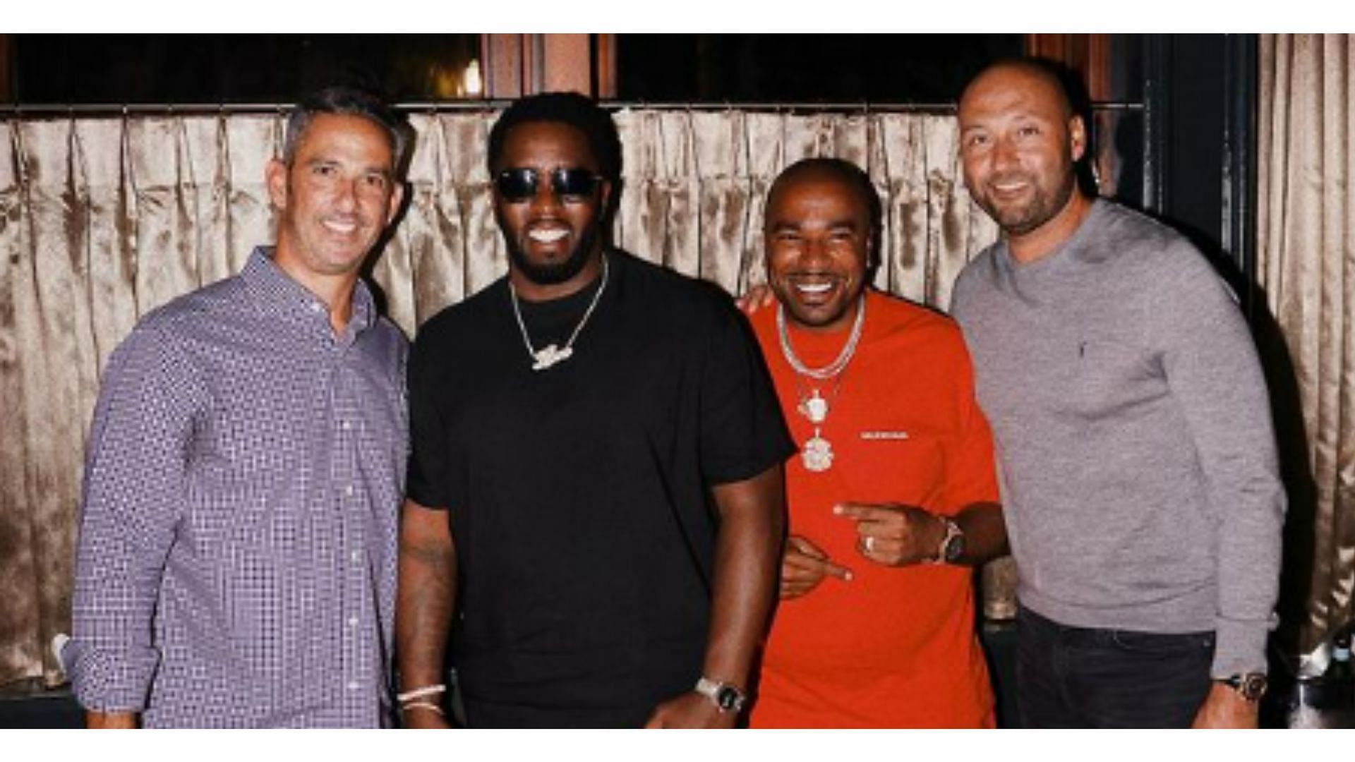 Derek Jeter and Jorge Posada with rappers P. Diddy and N.O.R.E. in NYC