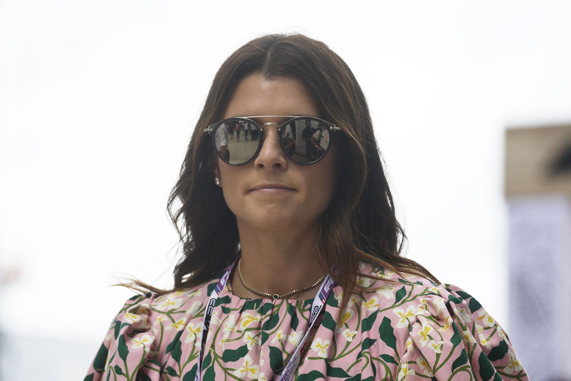 Danica Patrick walks in the Paddock before the 2022 F1 Miami Grand Prix at the Miami International Autodrome (Photo by Chris Graythen/Getty Images)