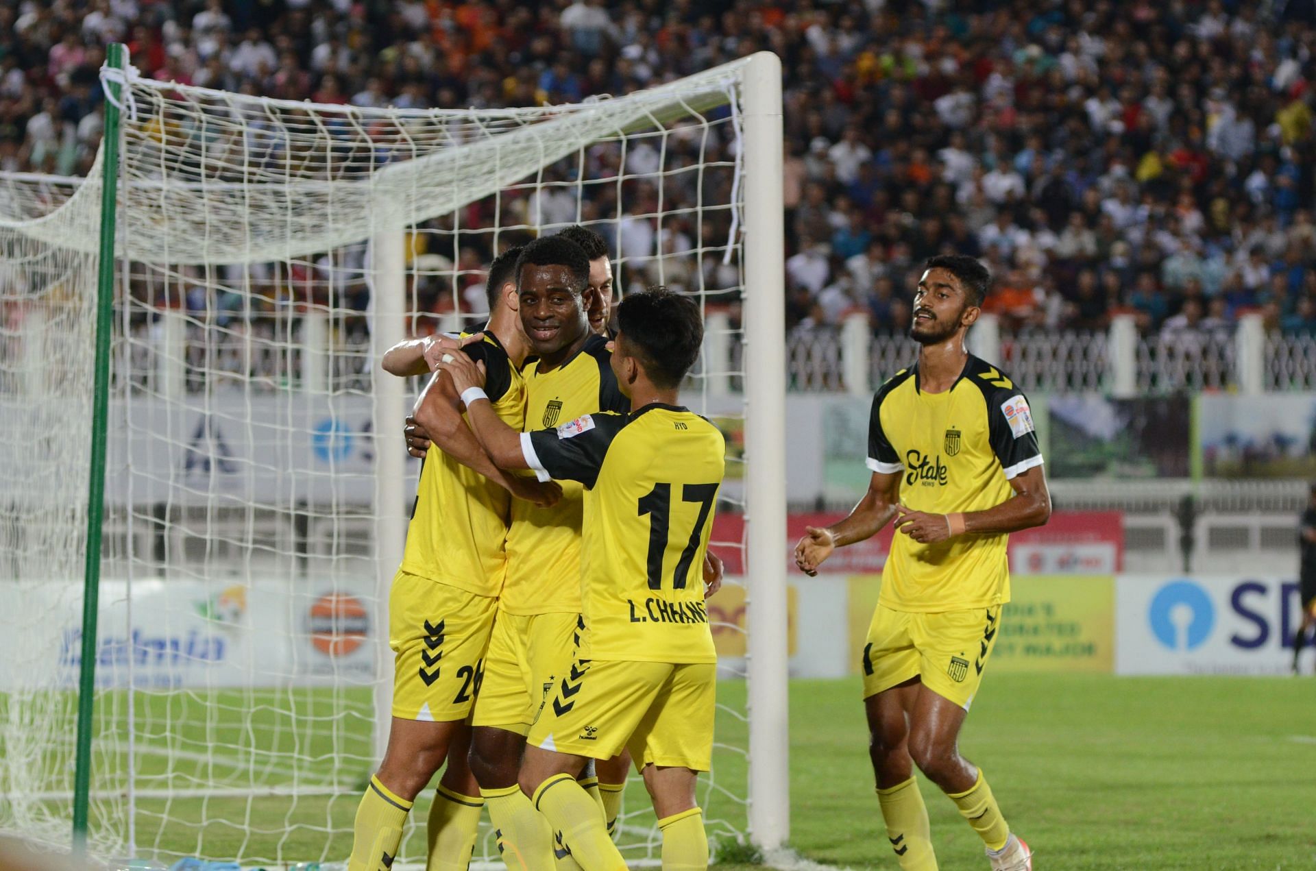 Hyderabad FC players celebrating their goal against Neroca FC.