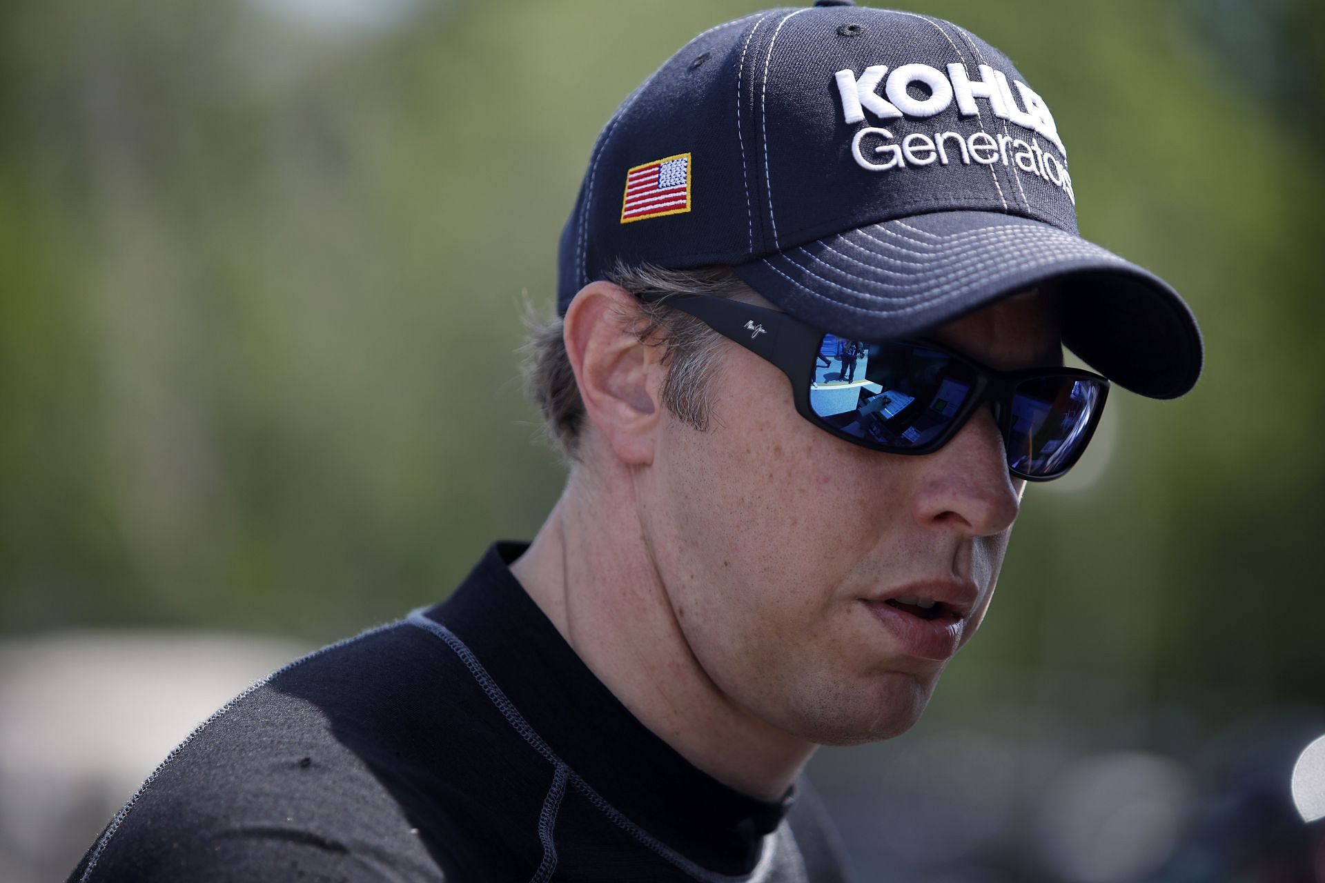 Brad Keselowski looks on during qualifying for the NASCAR Cup Series Kwik Trip 250 at Road America