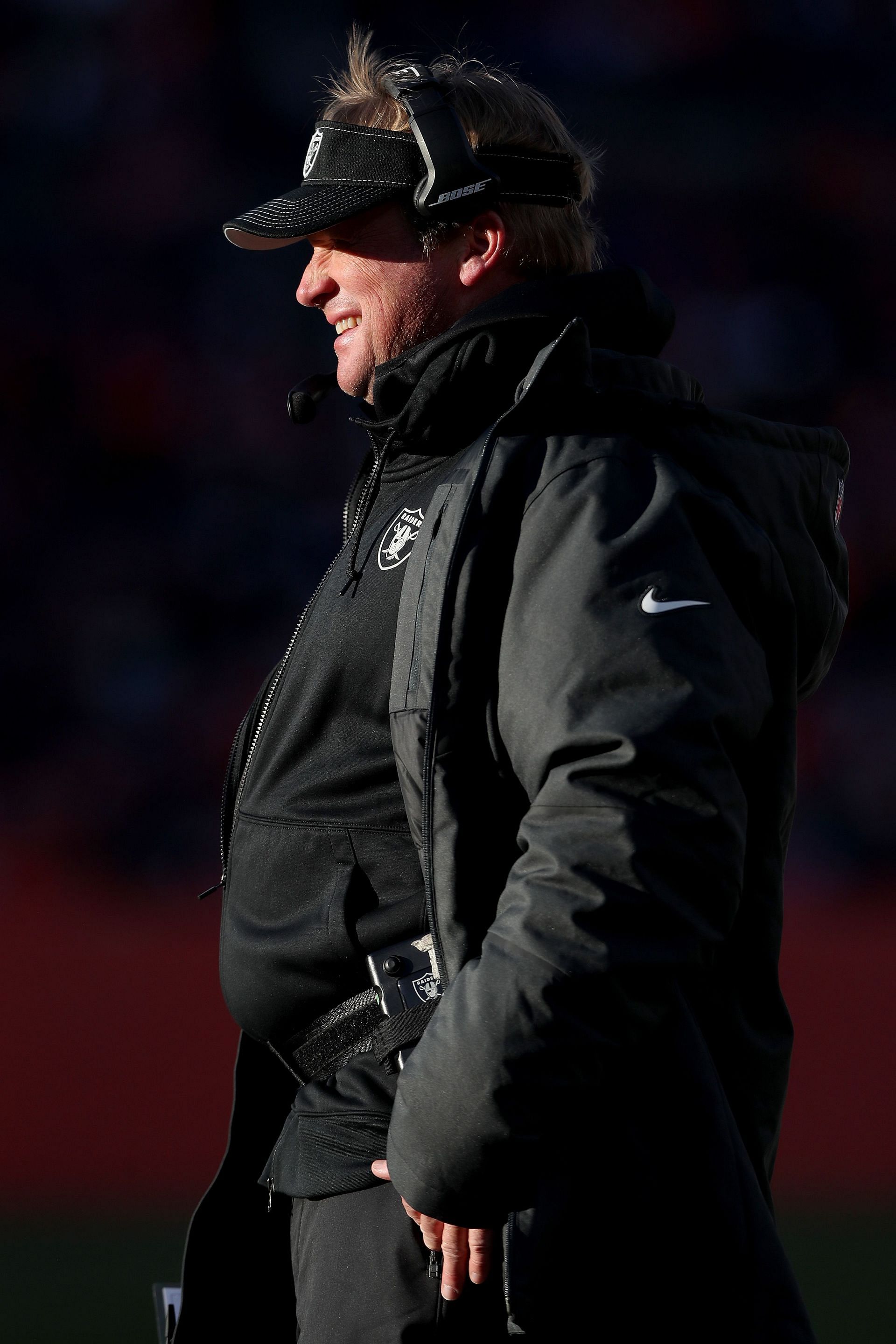 Jon Gruden at a Oakland Raiders v Denver Broncos game