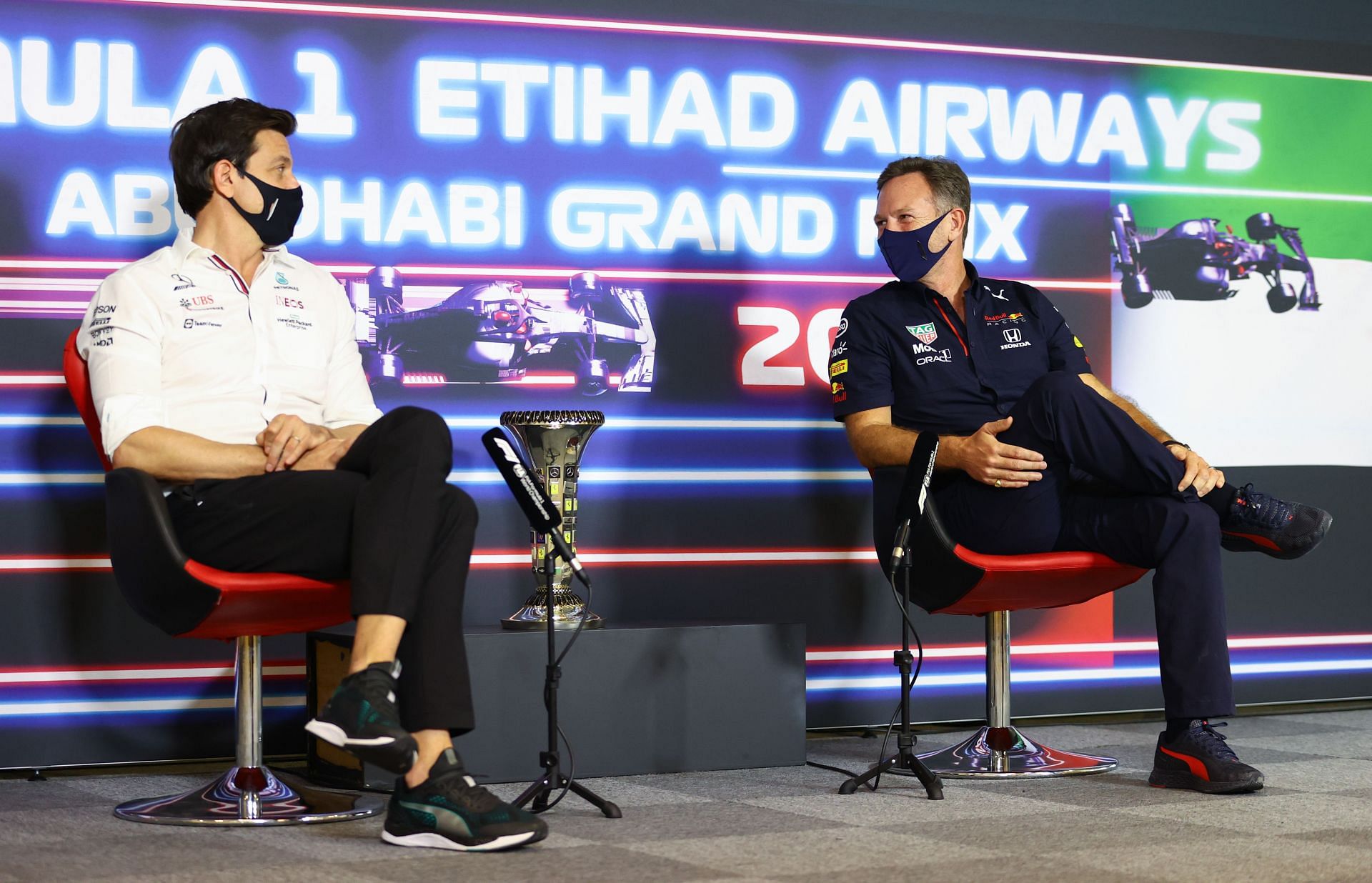 Mercedes team principal Toto Wolff (left) and his Red Bull counterpart Christian Horner (right) during the pre-race press conference at the 2021 F1 Abu Dhabi GP weekend (Photo by Bryn Lennon/Getty Images)