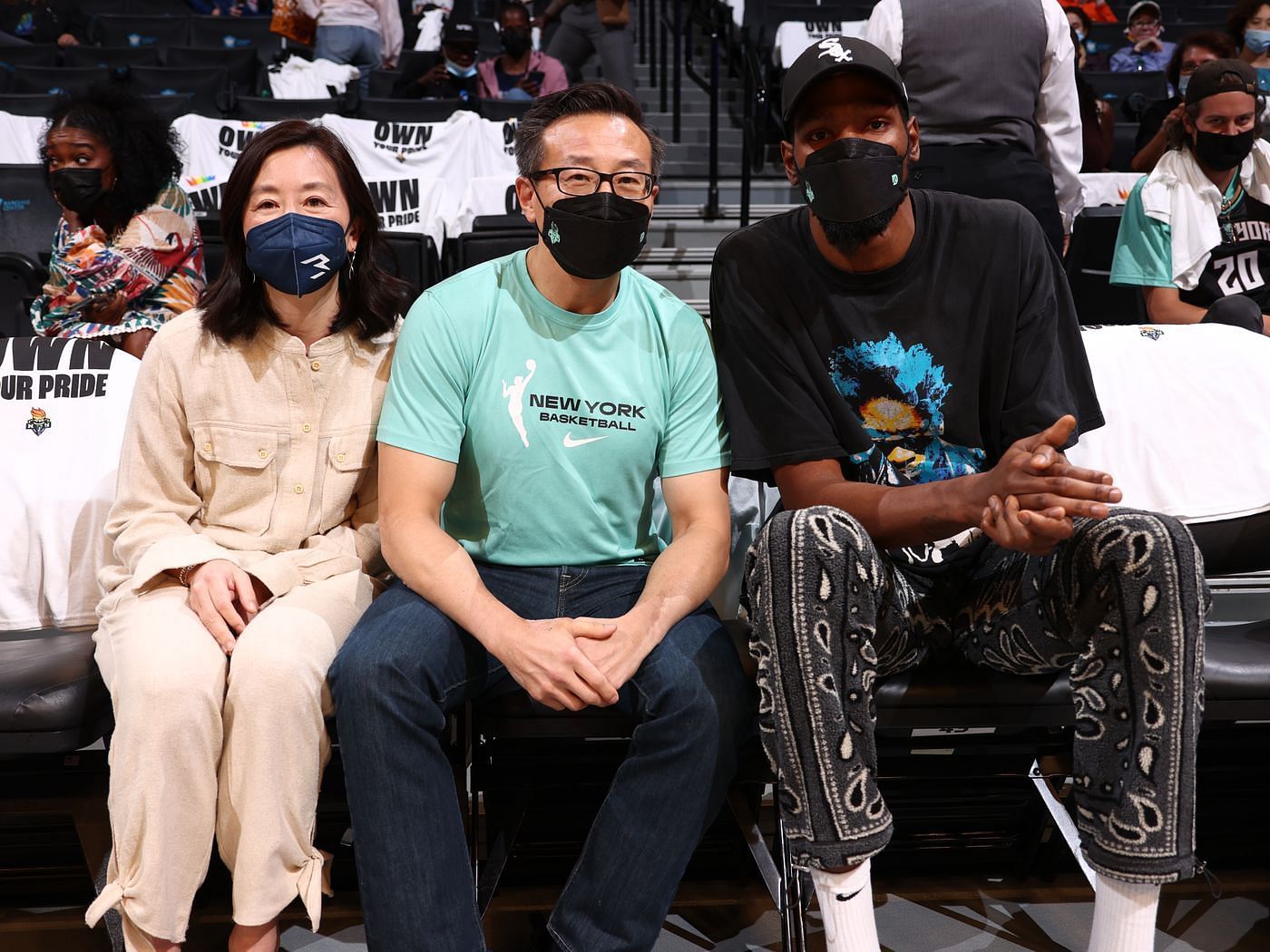 Kevin Durant, alongside Joe Tsai and Clara Wu Tsai