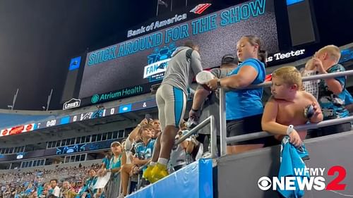 Carolina Panthers WR DJ Moore in the stands asking fans to stop fighting | Image: Screengrab