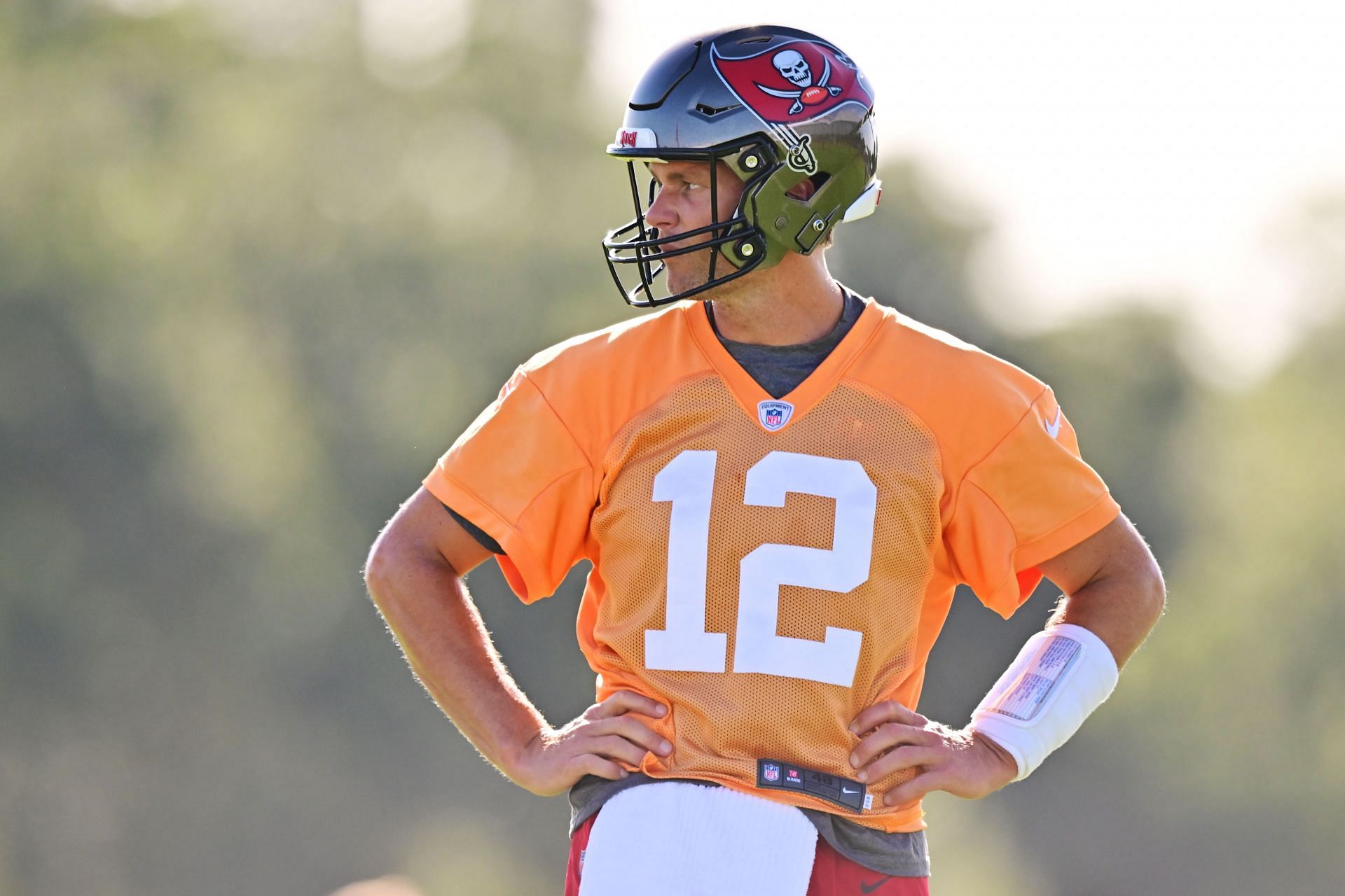 Tampa Bay Buccaneers quarterback Tom Brady looks over the field at training camp
