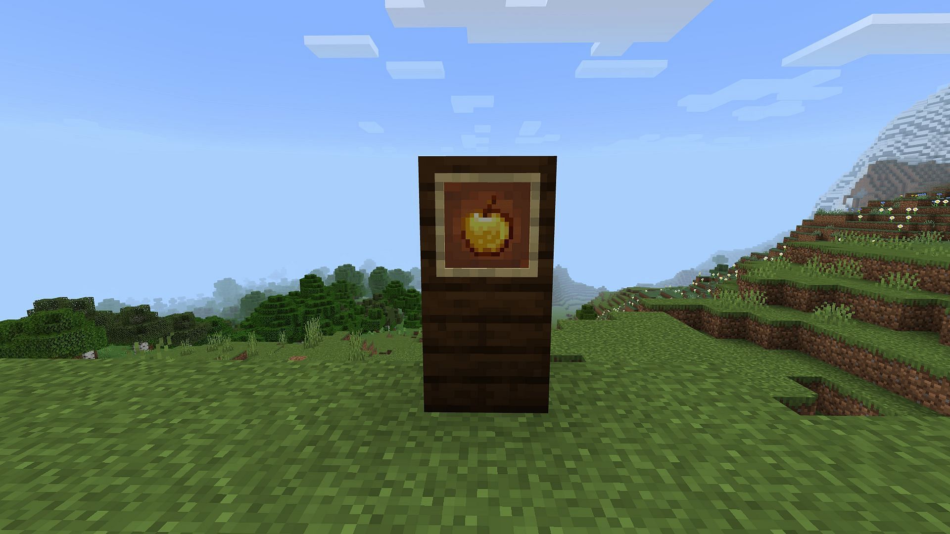 A golden apple in an item frame (Image via Mojang)