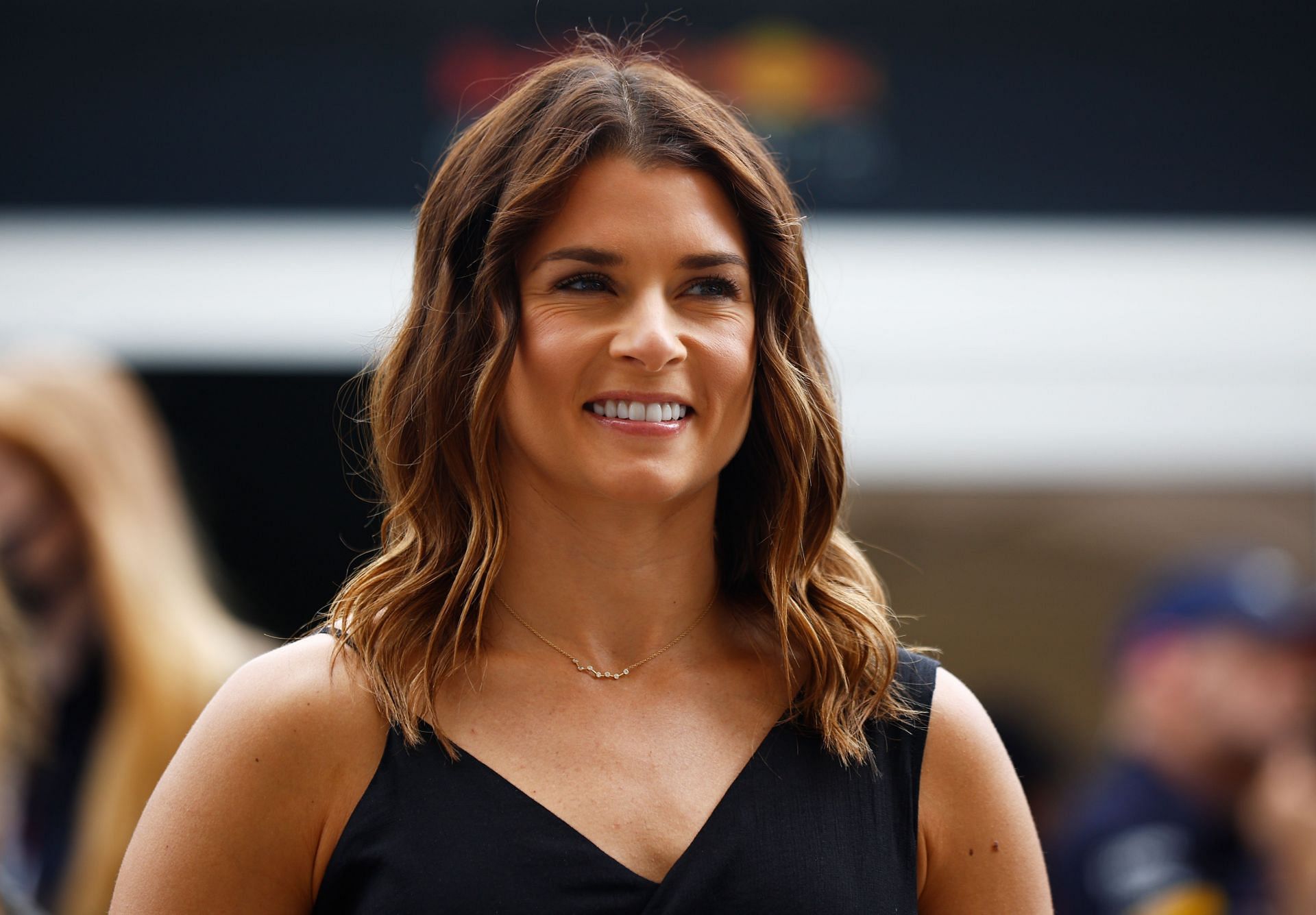 Danica Patrick looks on in the Paddock before the 2021 F1 US Grand Prix at the Circuit of the Americas in Austin, Texas (Photo by Jared C. Tilton/Getty Images)
