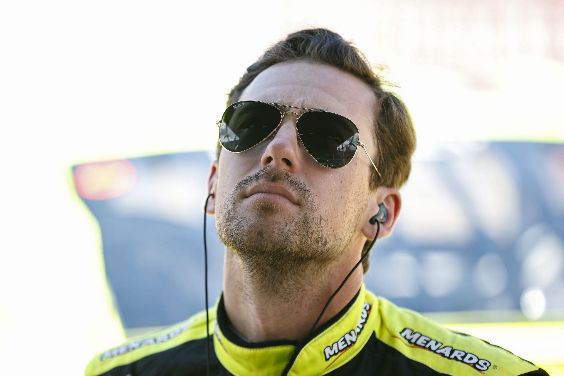 Ryan Blaney looks on in the garage area during practice for the 2022 NASCAR Cup Series FireKeepers Casino 400 at Michigan International Speedway in Brooklyn, Michigan. (Photo by Sean Gardner/Getty Images)