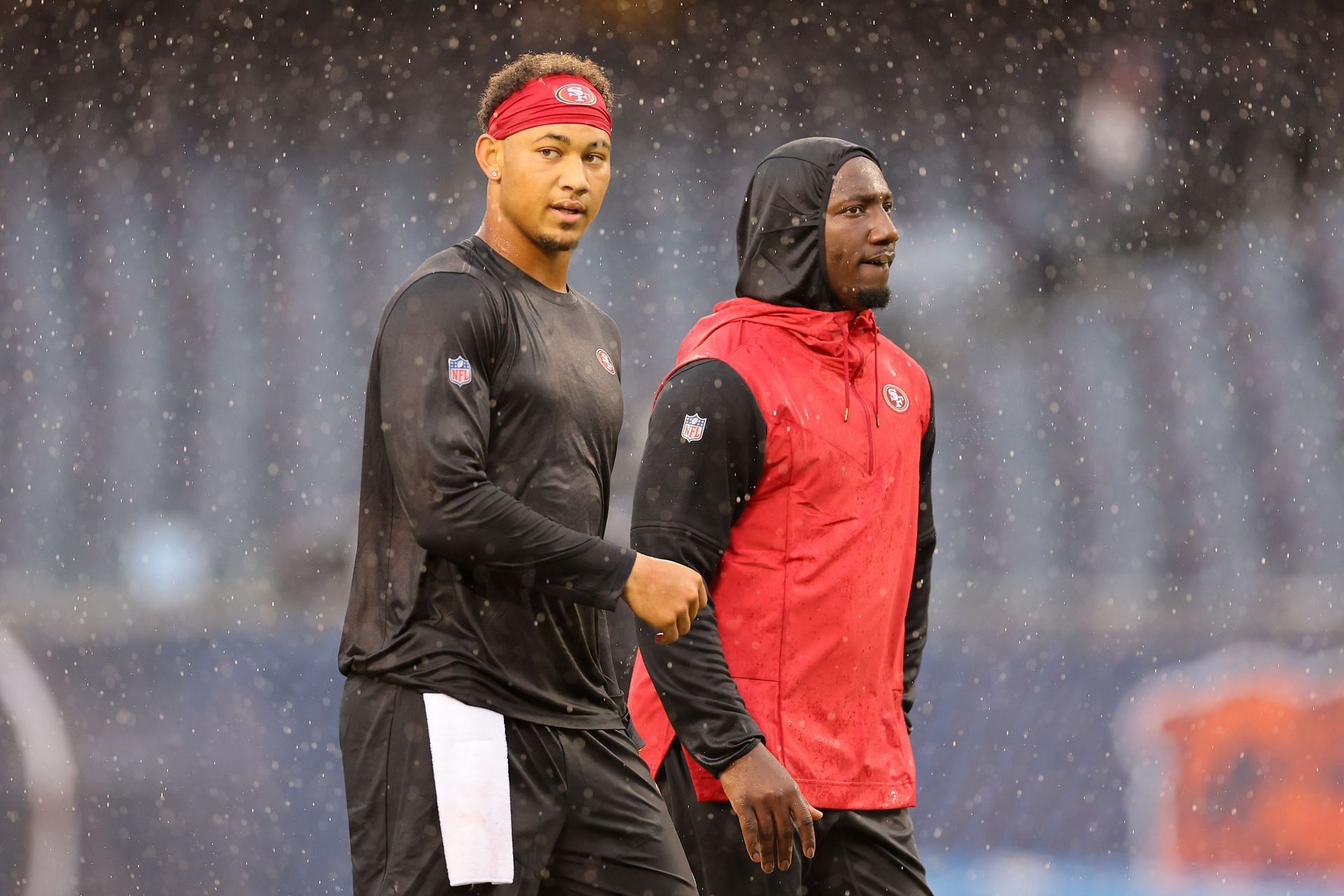 Trey Lance warms up with Deebo Samuel