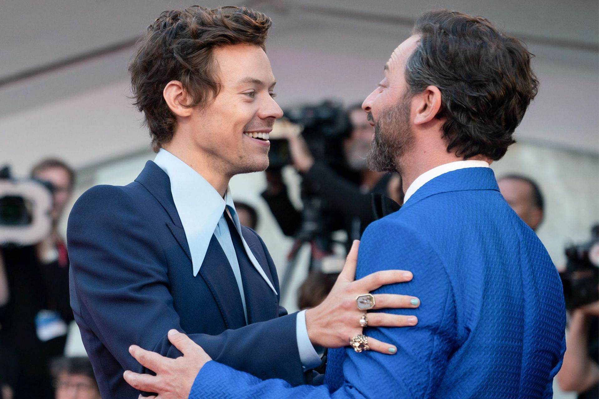Harry Styles and Nick Kroll kiss at Don
