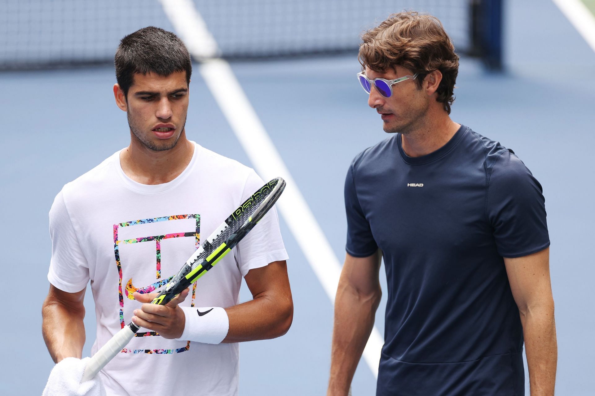 Carlos Alcaraz and his coach Juan Carlos Ferrero during a practice session at the 2022 US Open