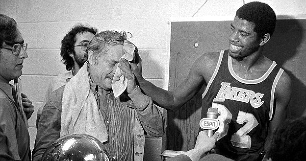 Magic Johnson and the late Dr. Jerry Buss [Photo source LA Times]