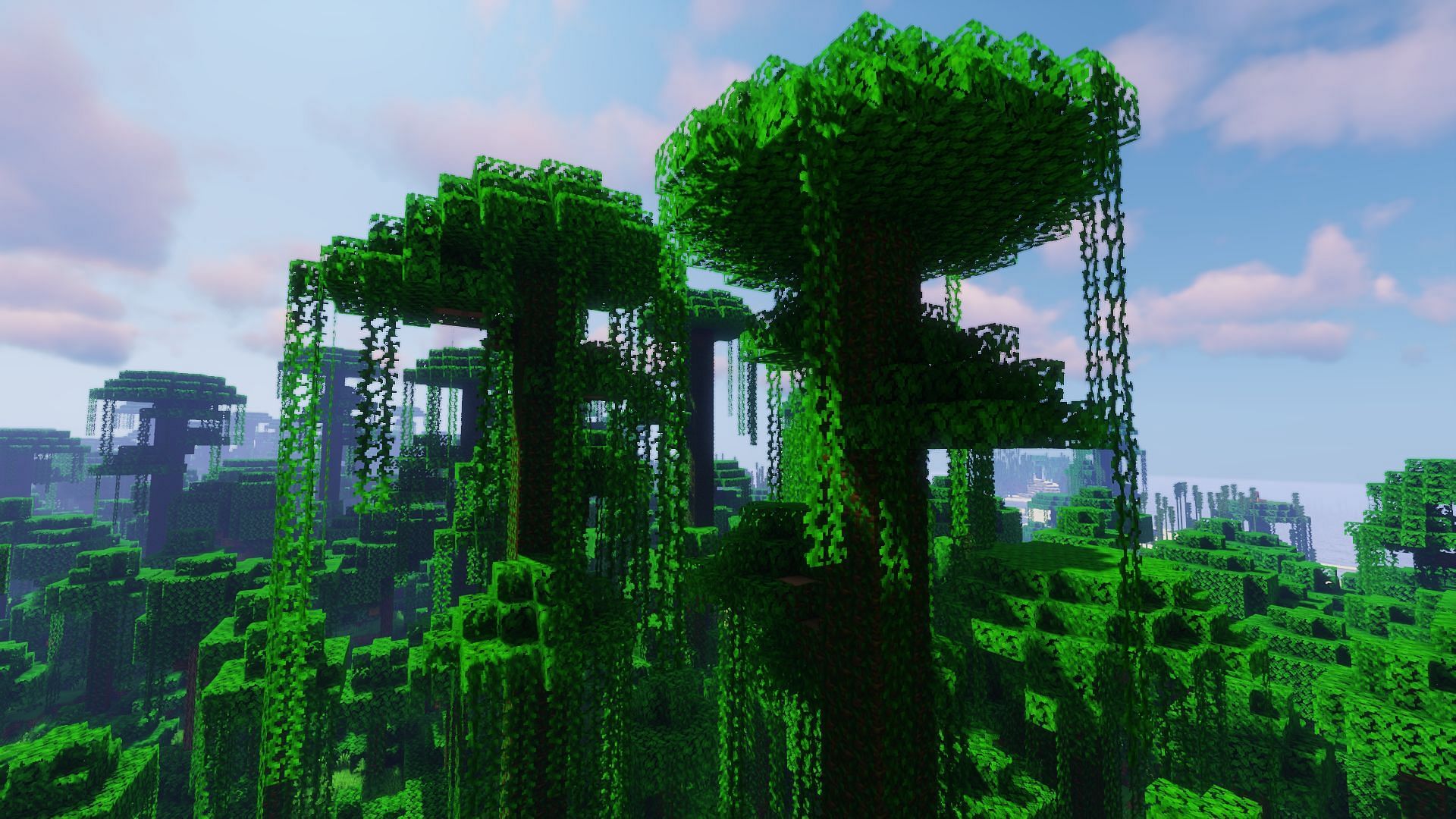 Vines growing over large jungle trees (Image via Minecraft)