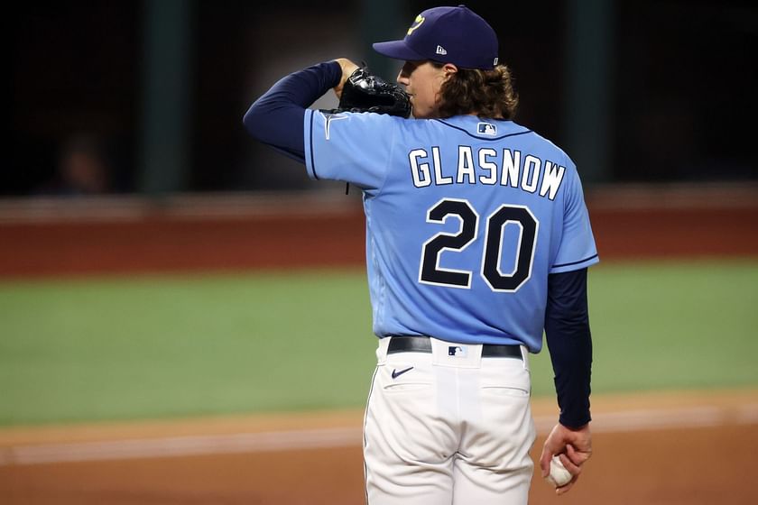 Tampa Bay Rays starting pitcher Tyler Glasnow wipes his face after