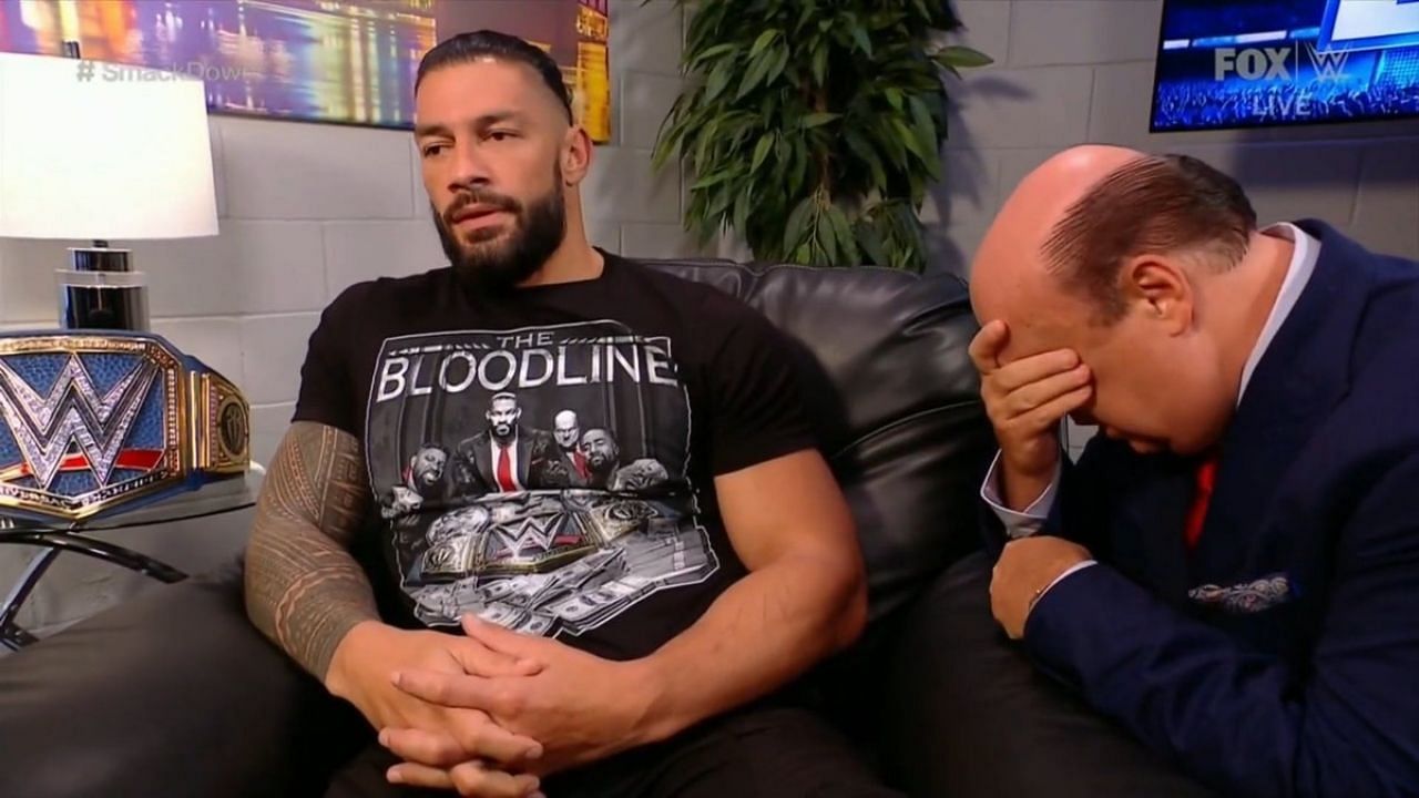 अनडिस्प्यूटेड WWE यूनिवर्सल चैंपियन रोमन रेंस और पॉल हेमन  