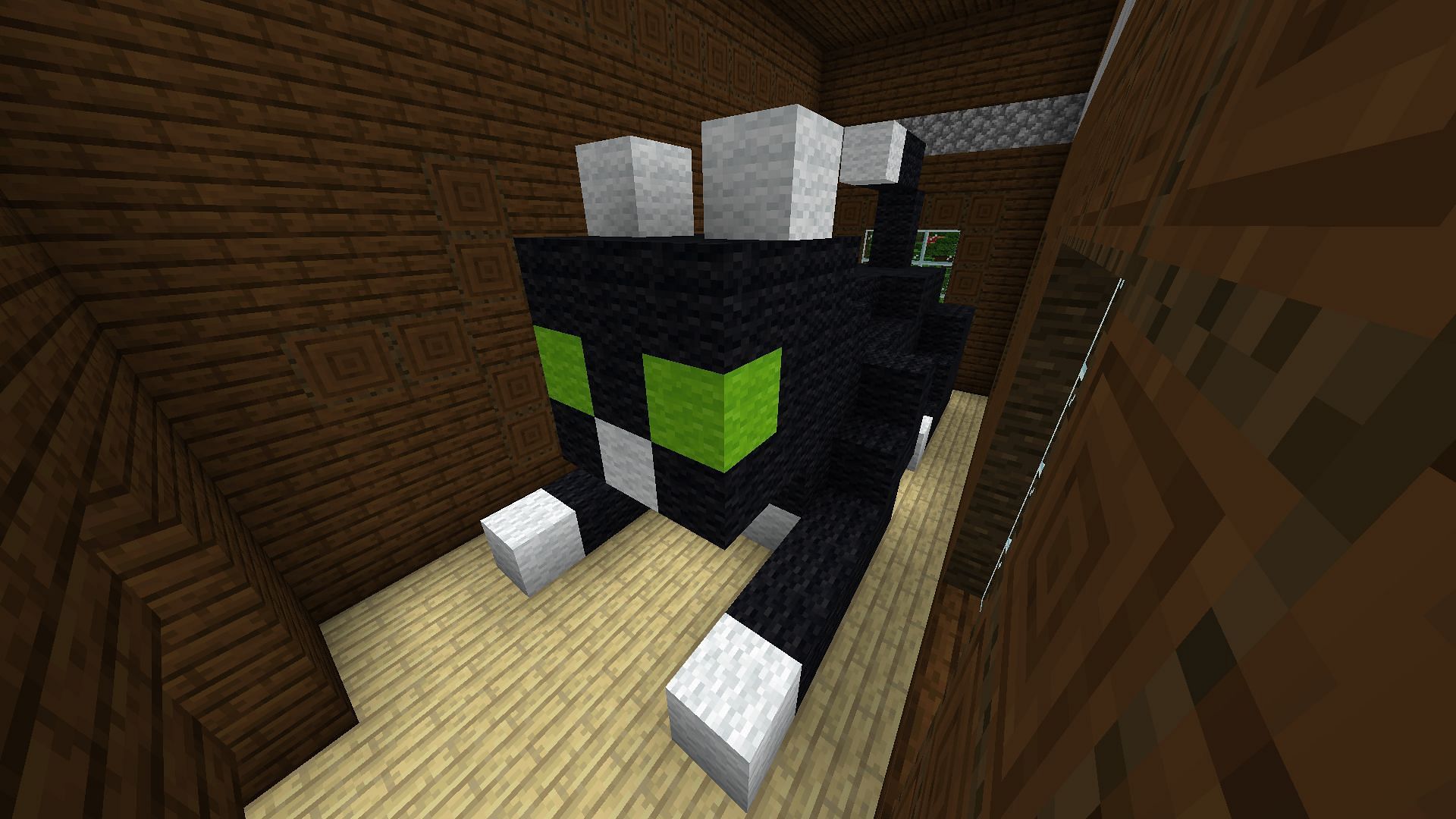 Cat statue inside the Minecraft structure (Image via Mojang)