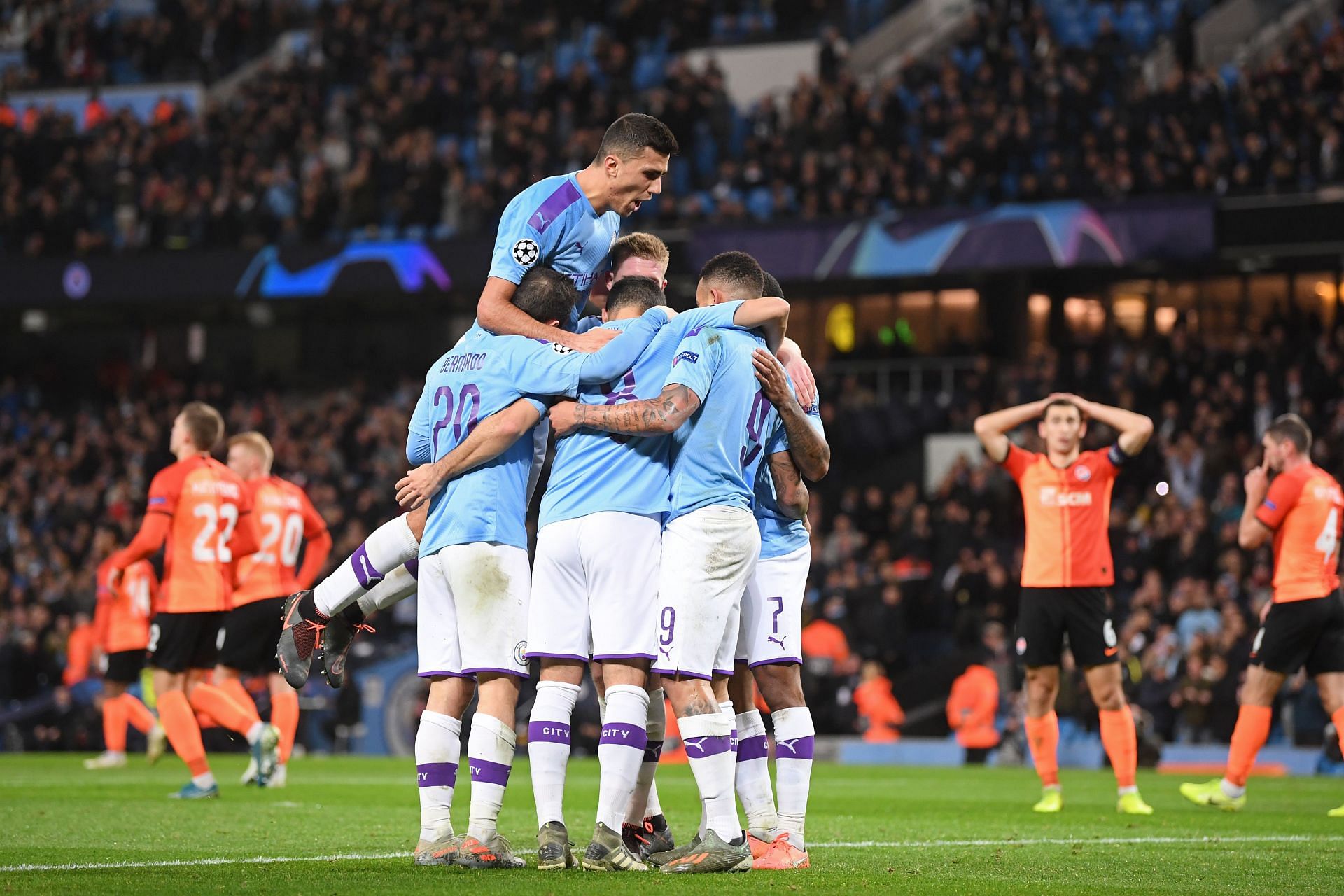 Manchester City celebrate during a Champions League encounter against Shakhtar Donetsk