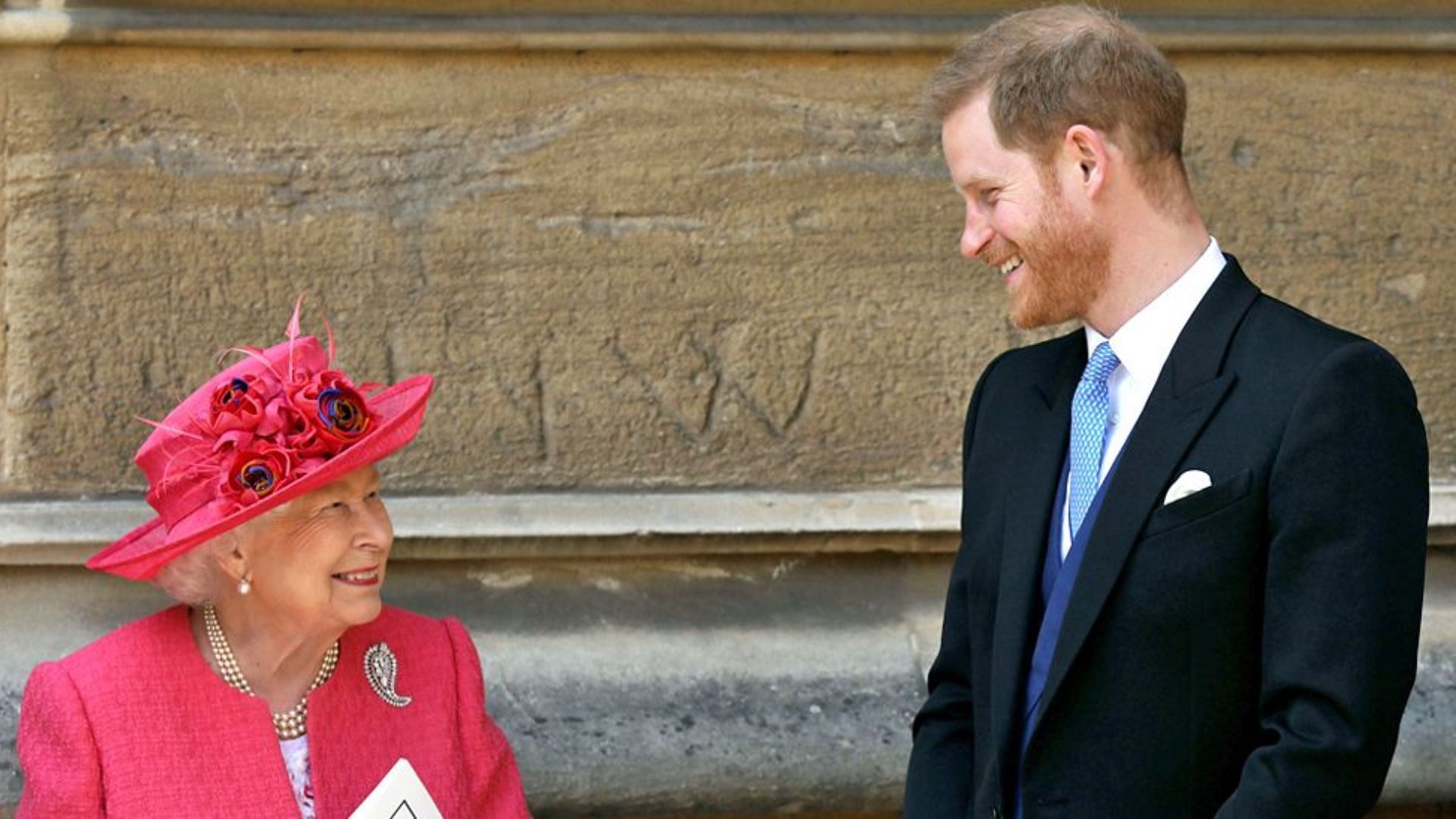 Queen Elizabeth II with grandson Prince Harry in 2019. (Image via WPA Pool/Getty Images)