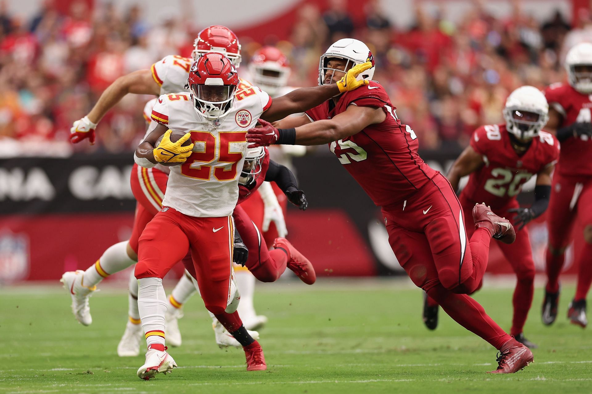 Kansas City Chiefs Isiah Pacheco and Travis Kelce and Patrick