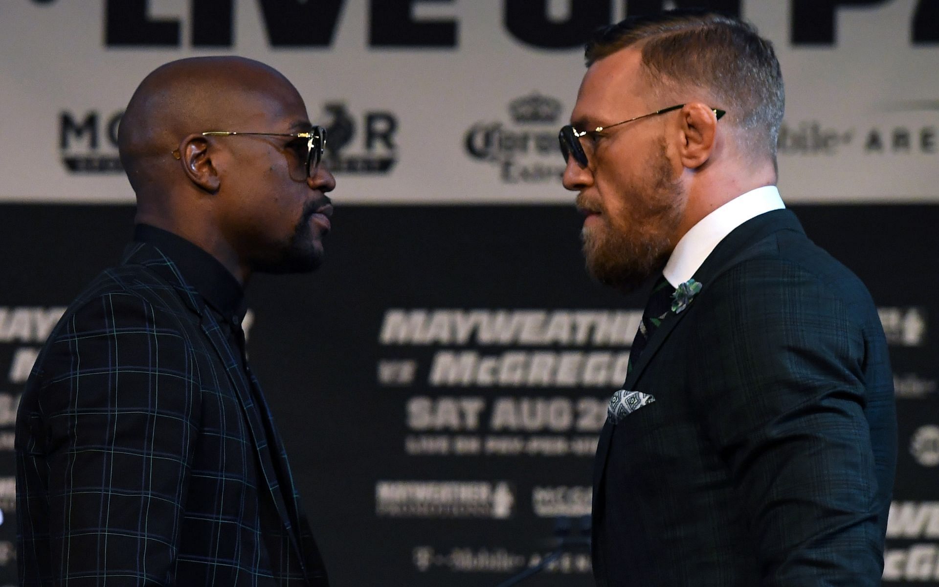 Floyd Mayweather (left) and Conor McGregor (right). [Image courtesy: Getty Images]