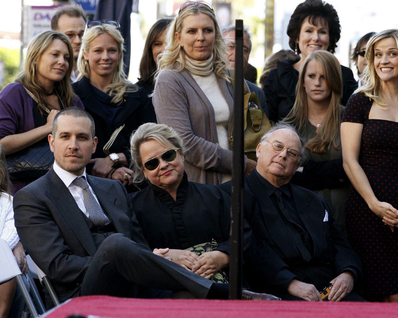 Reese Witherspoon, John Draper Witherspoon, Mary Elizabeth Witherspoon, Jim Toth at the unveiling of her star on the Hollywood Walk of Fame (Image via Alamy)