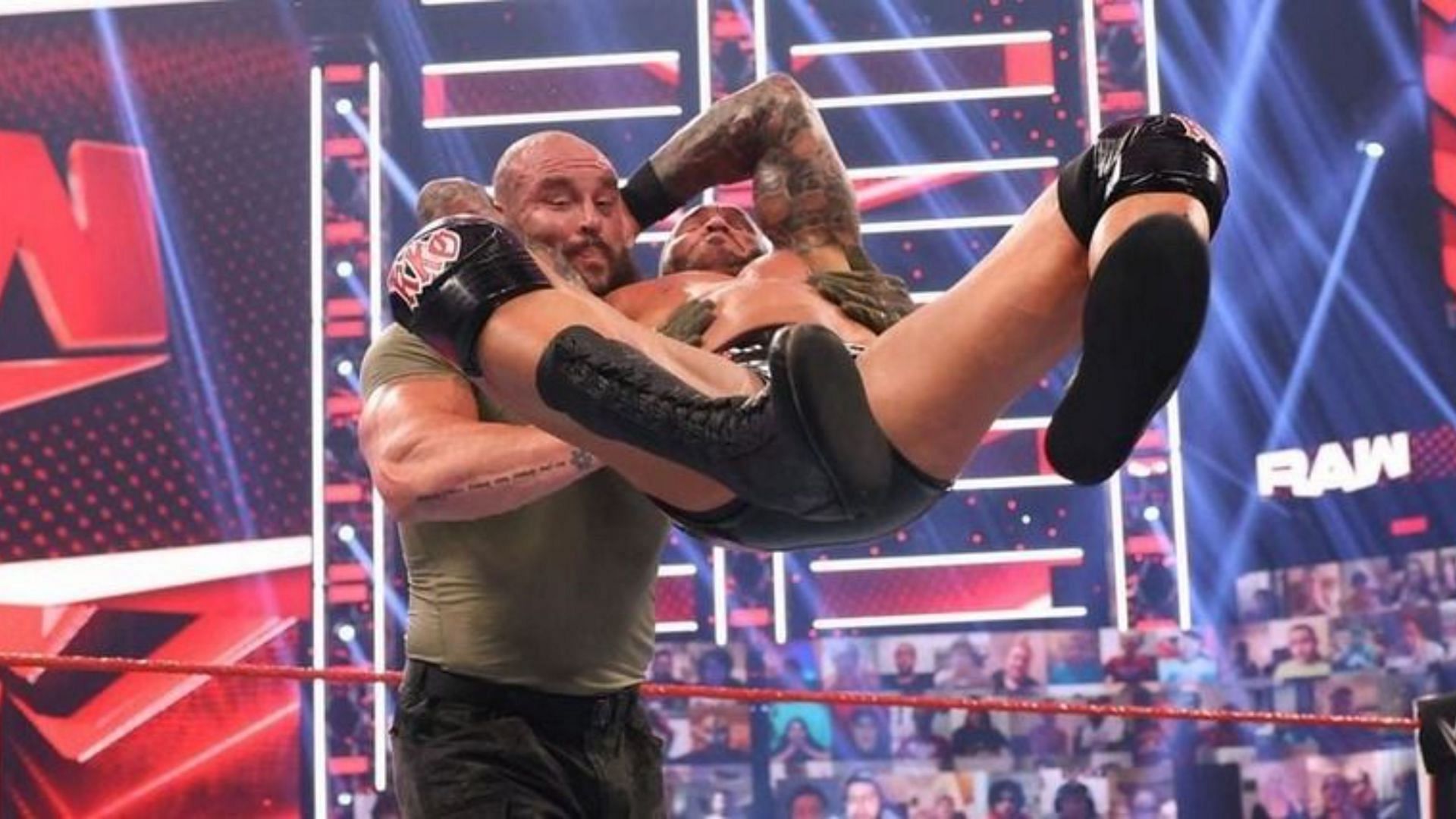 Randy Orton delivering an RKO to Braun Strowman