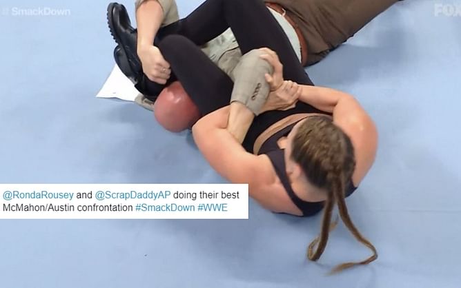 "Now no one will respect him" - Twitter explodes as Ronda Rousey puts Adam Pearce in an armbar after being called a "b**ch"