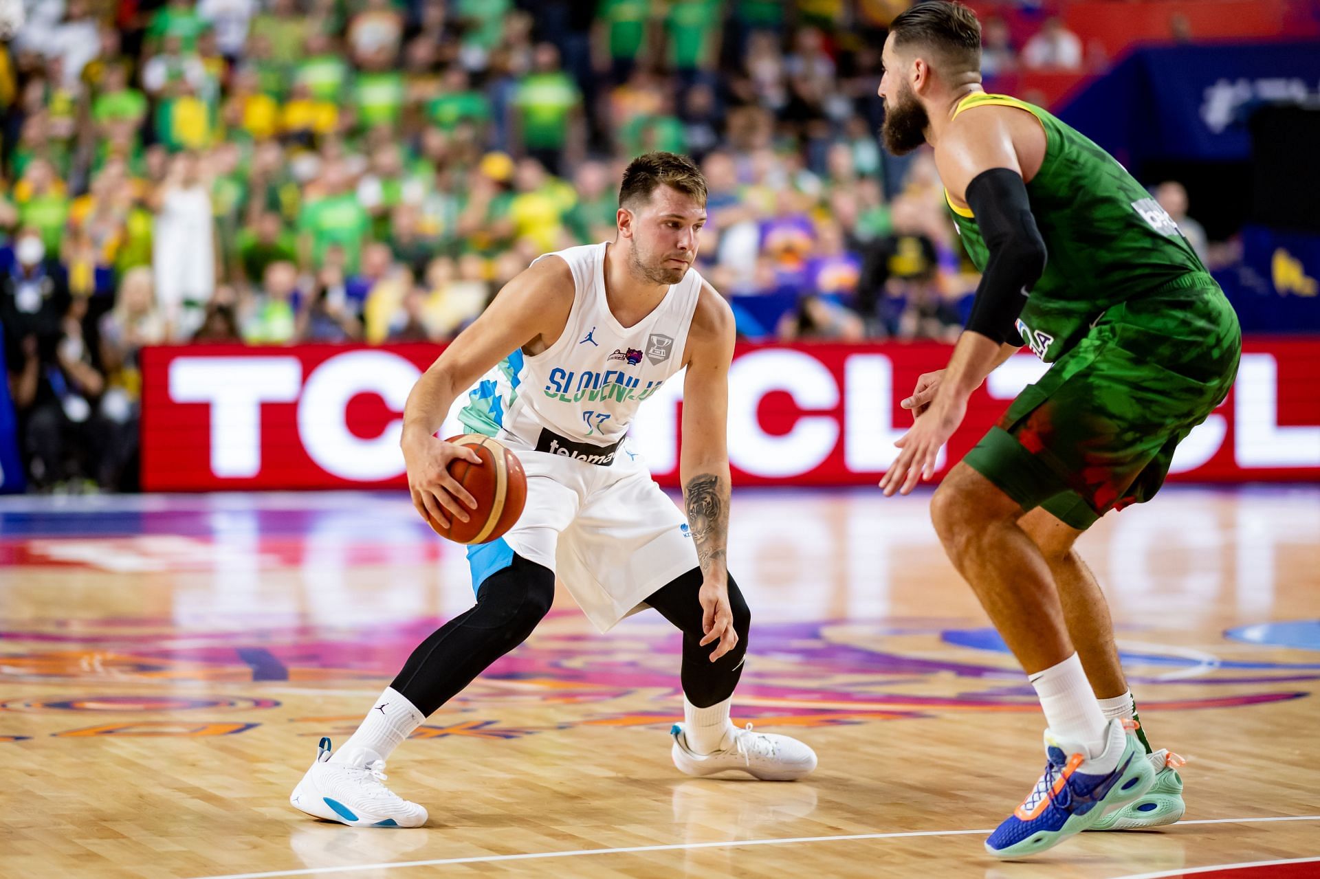 Luka Doncic sizes up Jonas Valanciunas at the EuroBasket.
