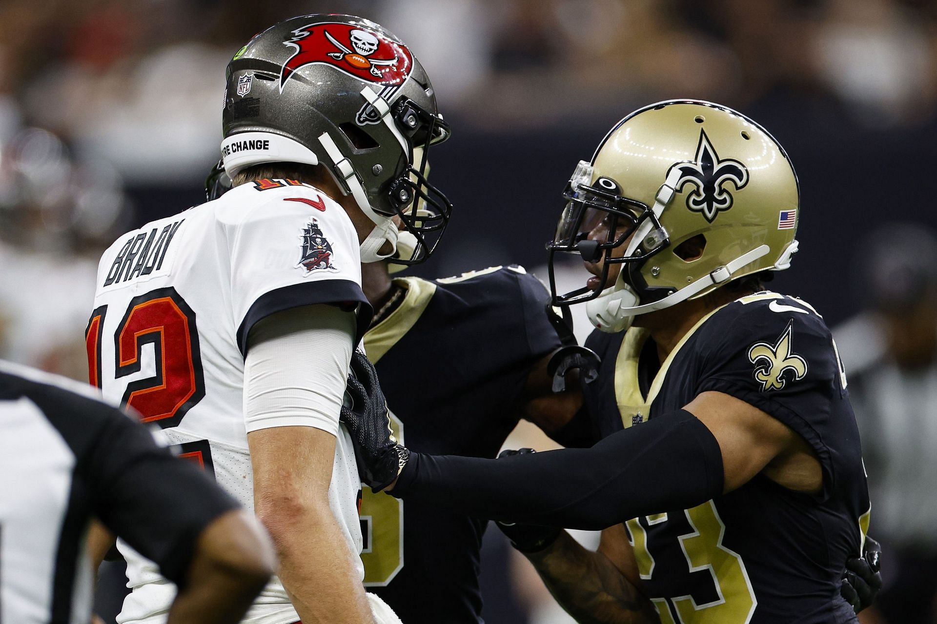 Tom Brady and Marshon Lattimore