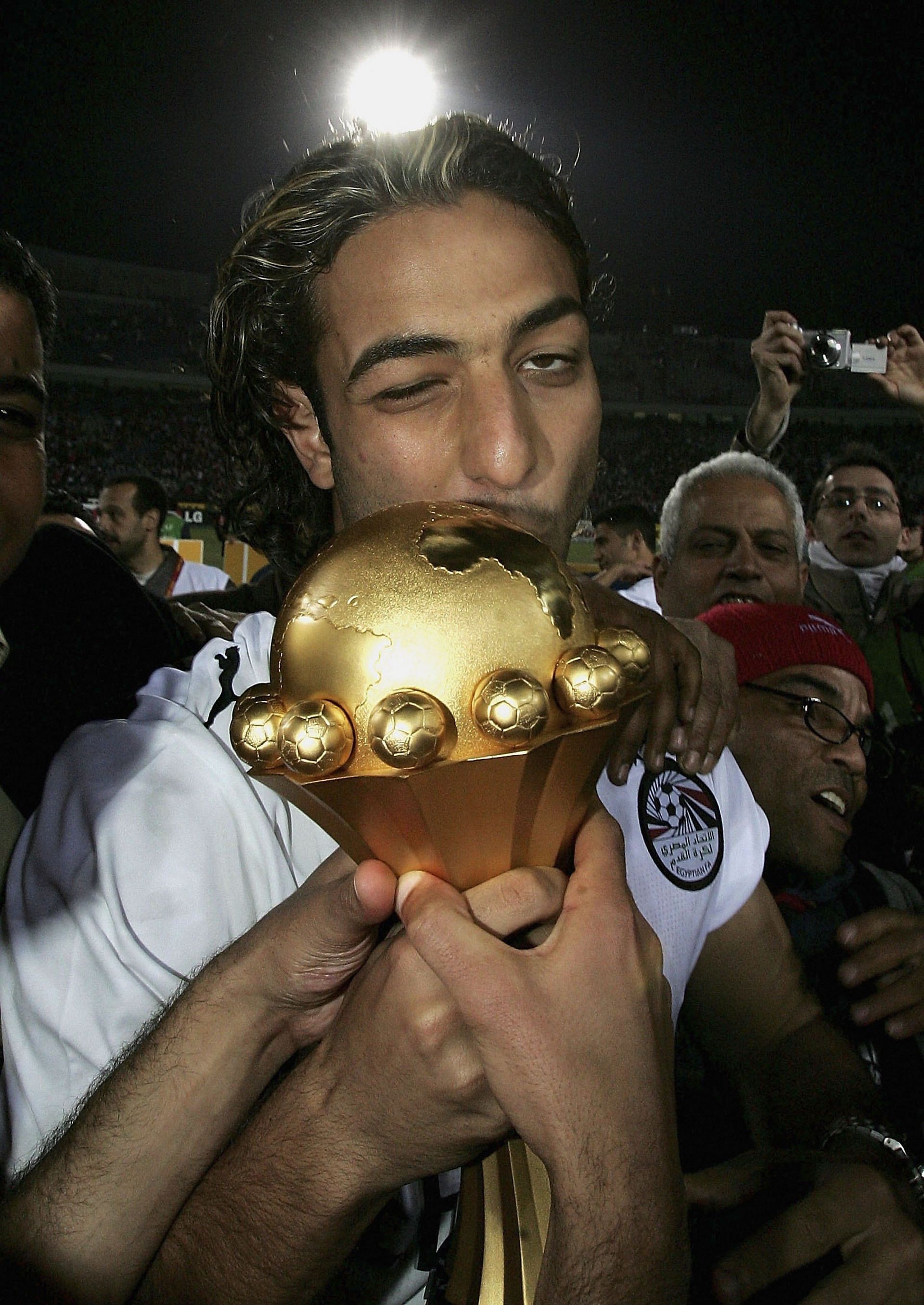 Mido of Egypt kisses the trophy after his country wins The African Cup of Nations Final between Egypt and Ivory Coast at The Cairo International Stadium on February 10, 2006, in Cairo.