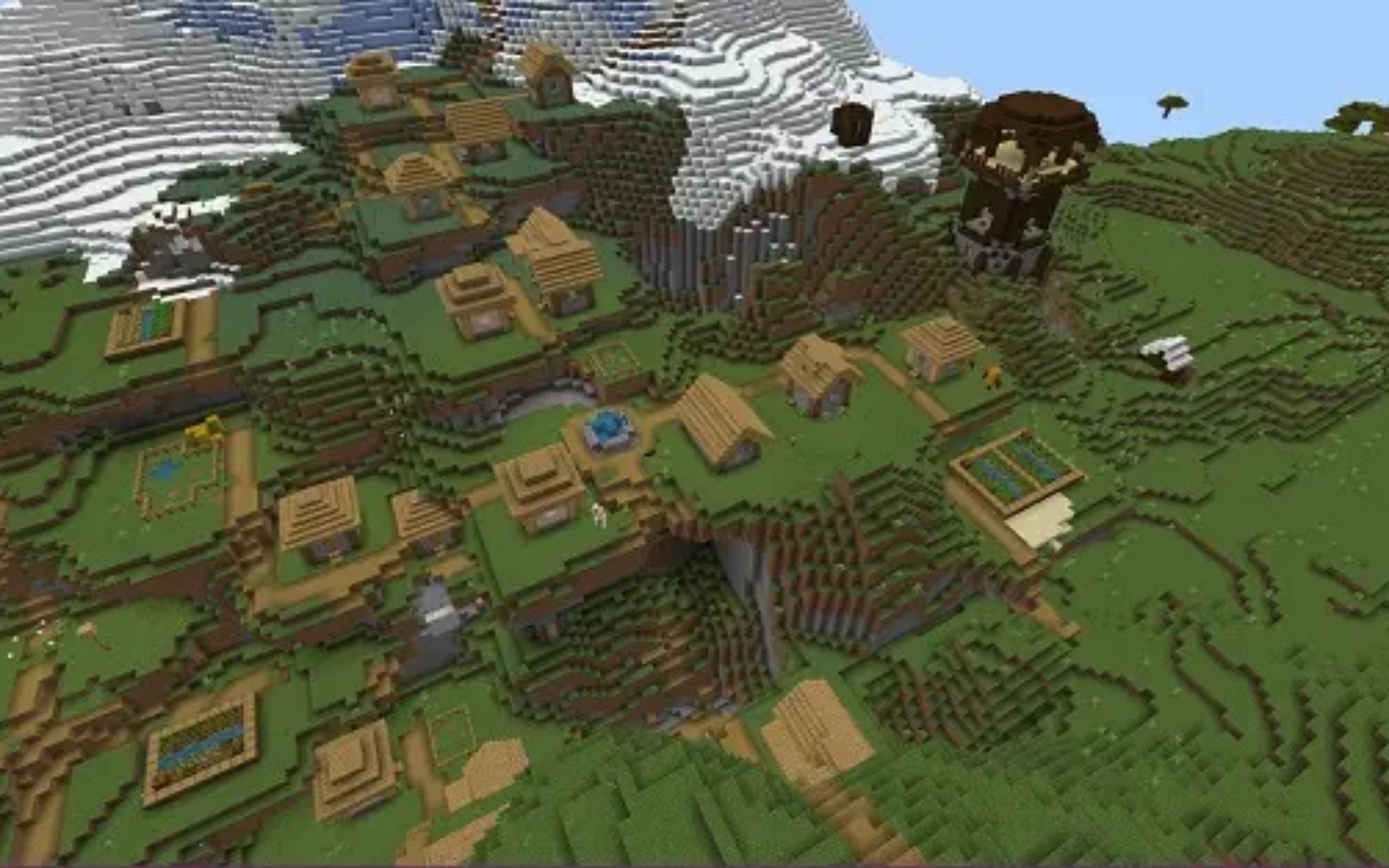 One of the villages beside a pillager tower (Image via Minecraft)