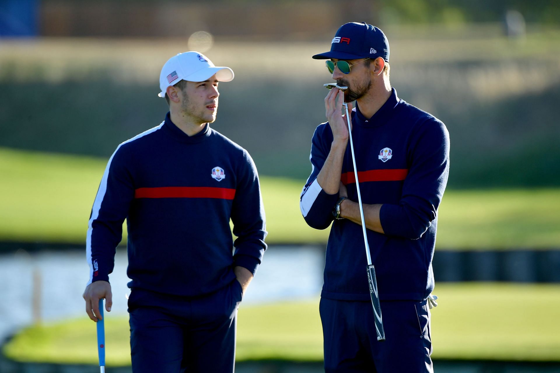 Michael Phelps and Nick Jonas at Ryder Cup (Image via Stuart Franklin/Getty Images)