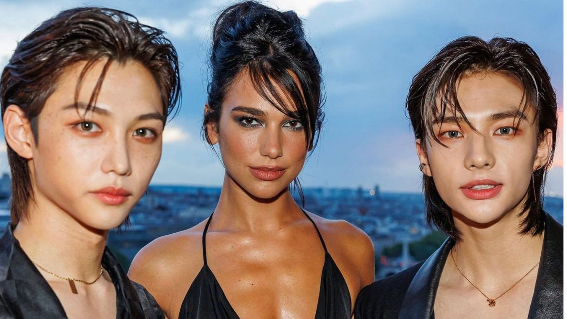 Stray Kids members Felix and Hyunjin appear in the same frame with Dua Lipa at the YSL Paris show. (Image via Instagram/@yslbeauty)