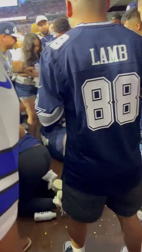 WATCH: Furious Cowboys supporters jump a fan following their defeat to  Buccaneers