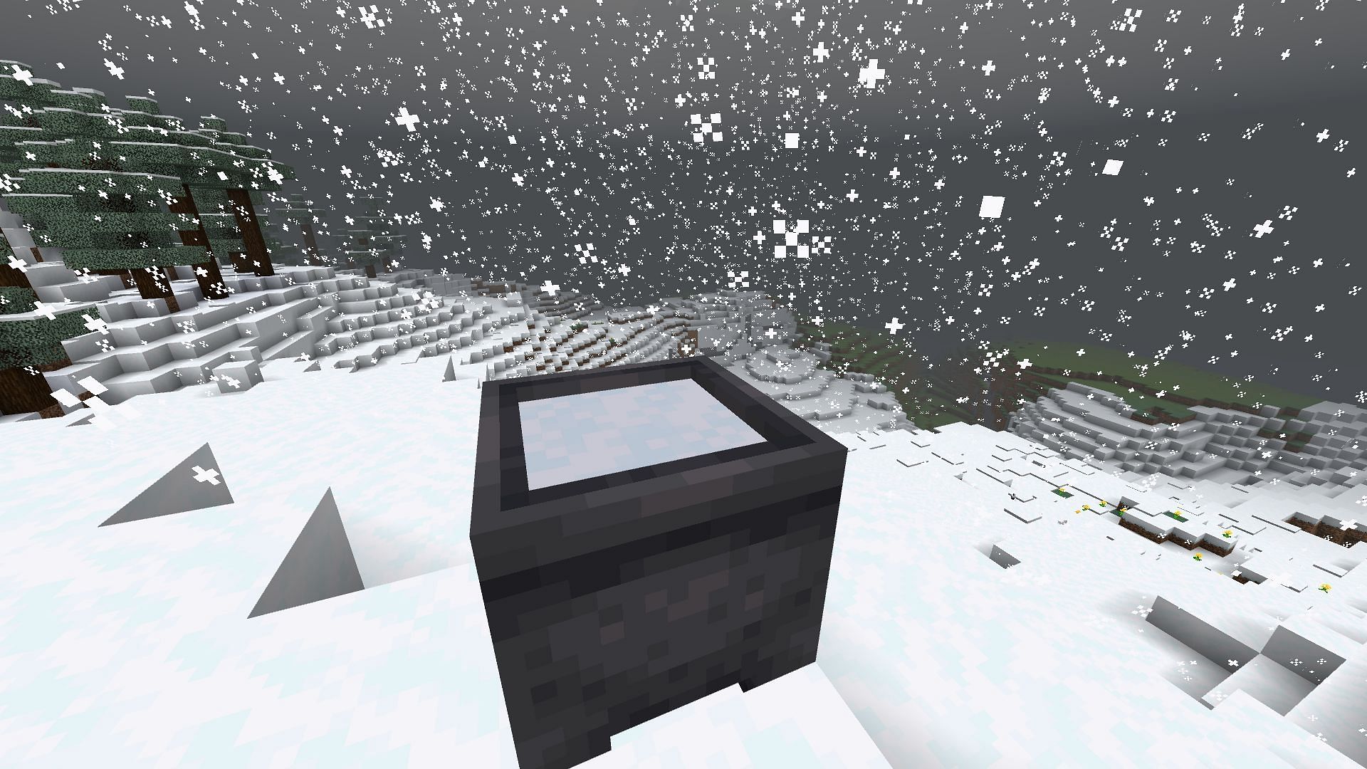 Players can fill cauldrons with powdered snow during snowy weather or pour it from a bucket in Minecraft (Image via Mojang)