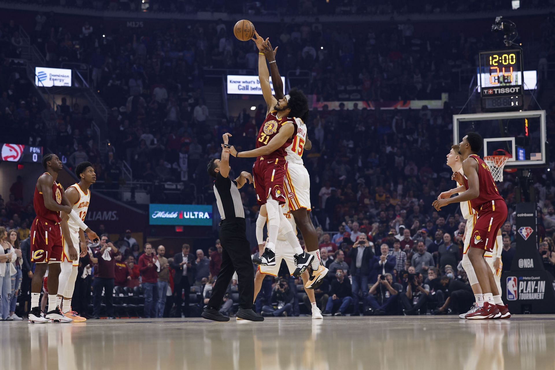 Jarrett Allen #31 of the Cleveland Cavaliers wins the tip off over Clint Capela #15 of the Atlanta Hawks in the first half at Rocket Mortgage Fieldhouse on April 15, 2022 in Cleveland, Ohio.