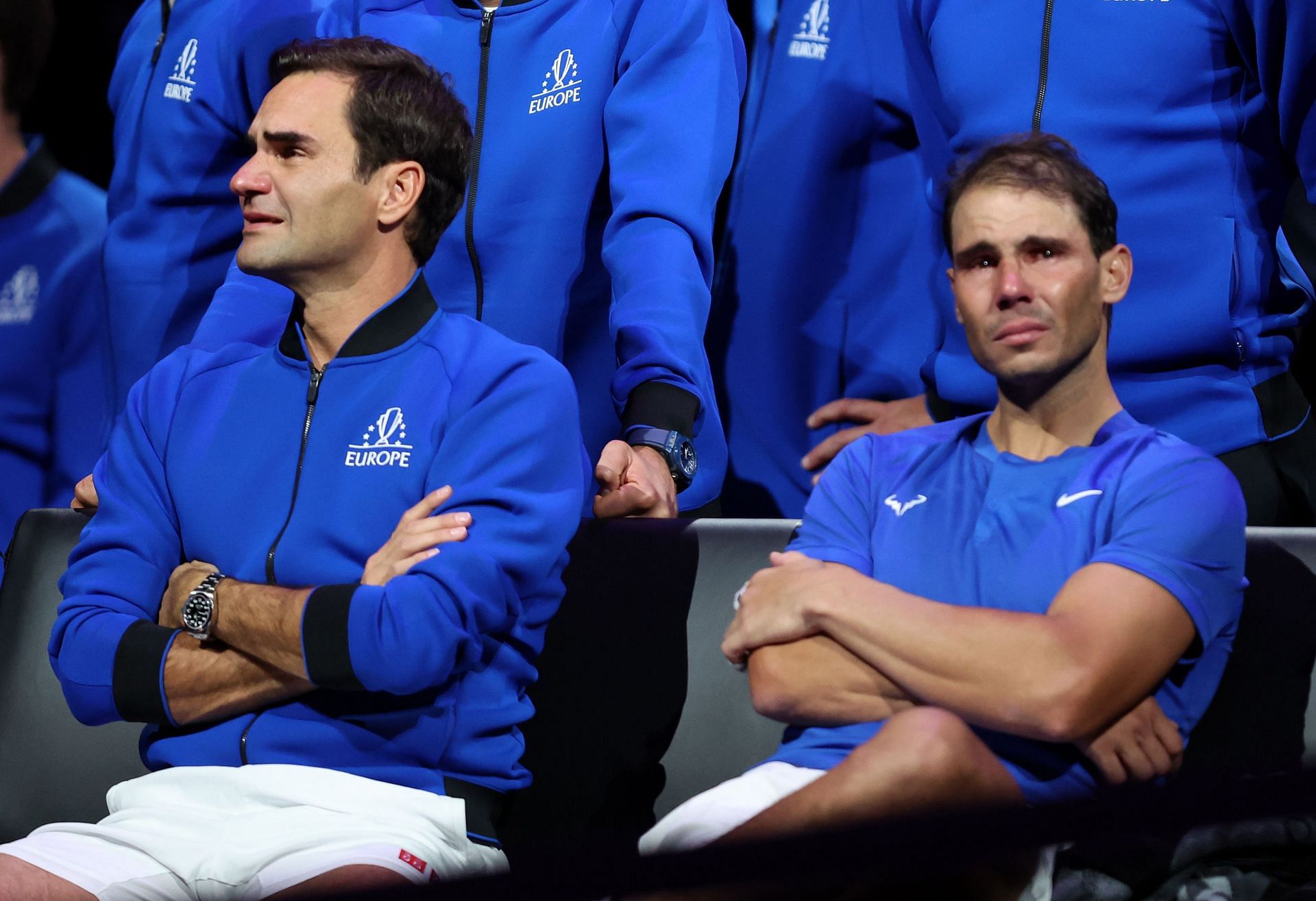 Roger Federer (L) and Rafael Nadal after their match ended