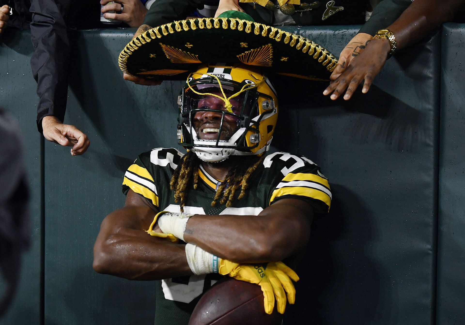 Aaron Jones celebrates a touchdown - Detroit Lions v Green Bay Packers