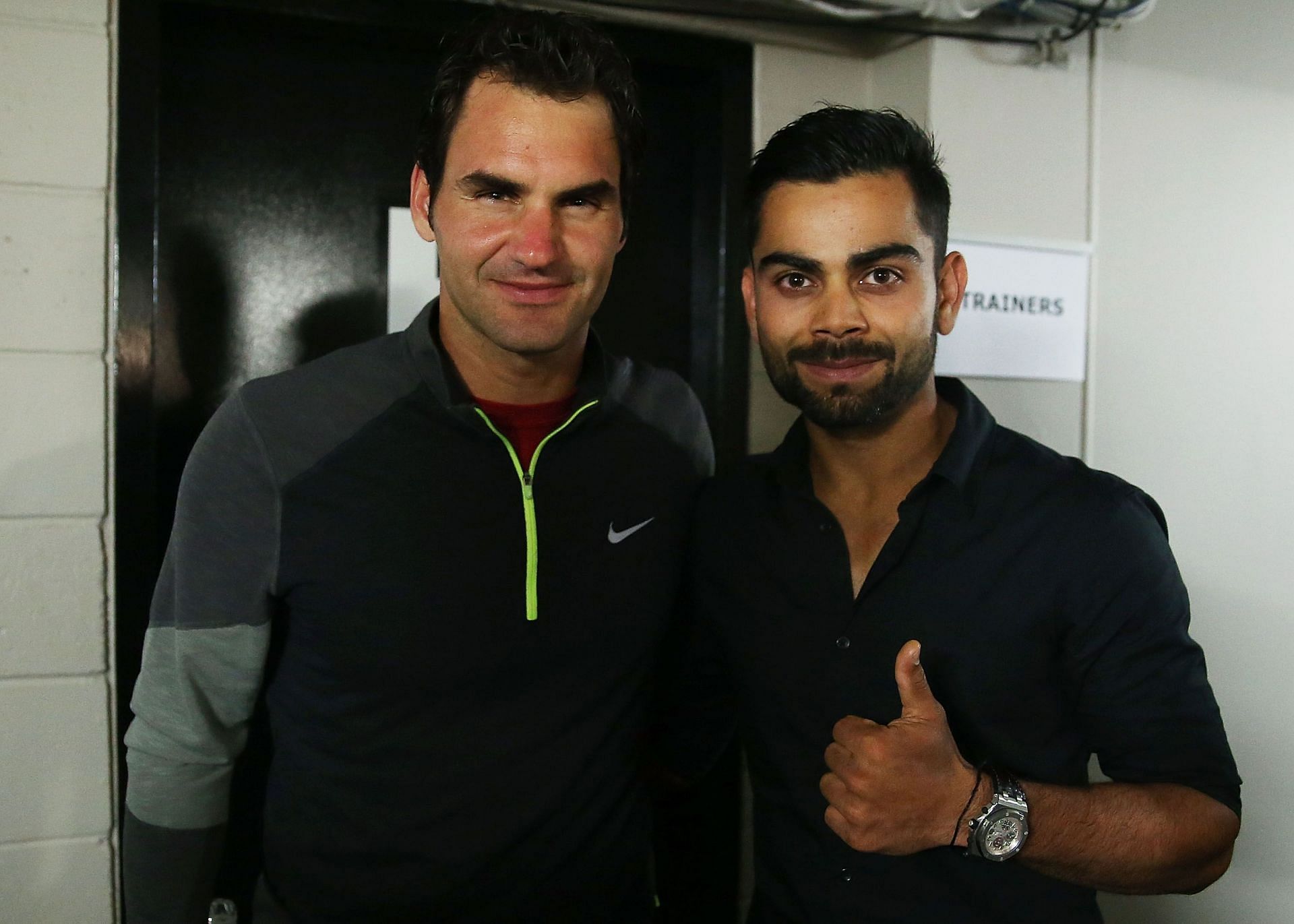 Roger Federer (L) and Virat Kohli