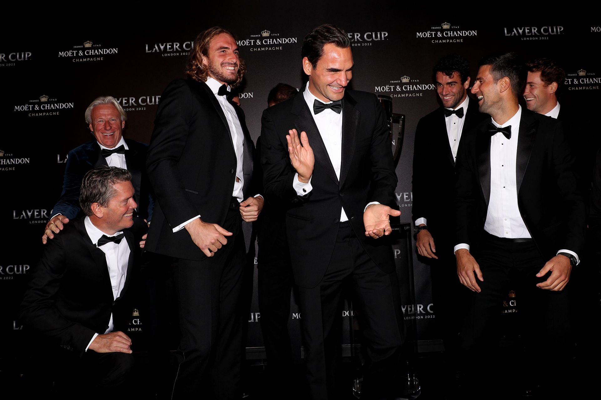 Stefanos Tsitsipas (third from left) and Roger Federer (fourth from left) share a light moment with the rest of Team Europe.