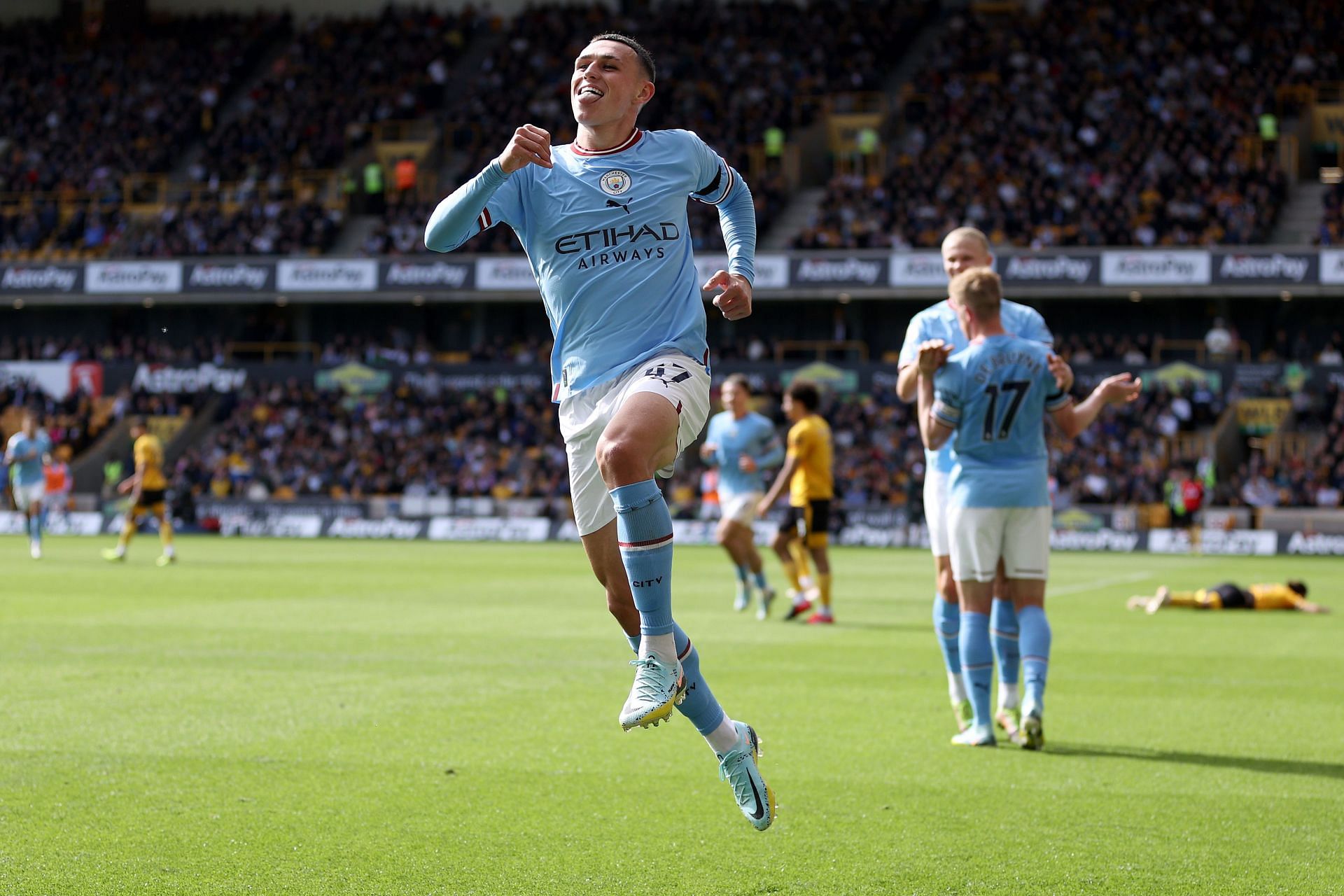 Phil Foden celebrates after scoring Manchester City&#039;s third goal against Wolverhampton Wanderers.
