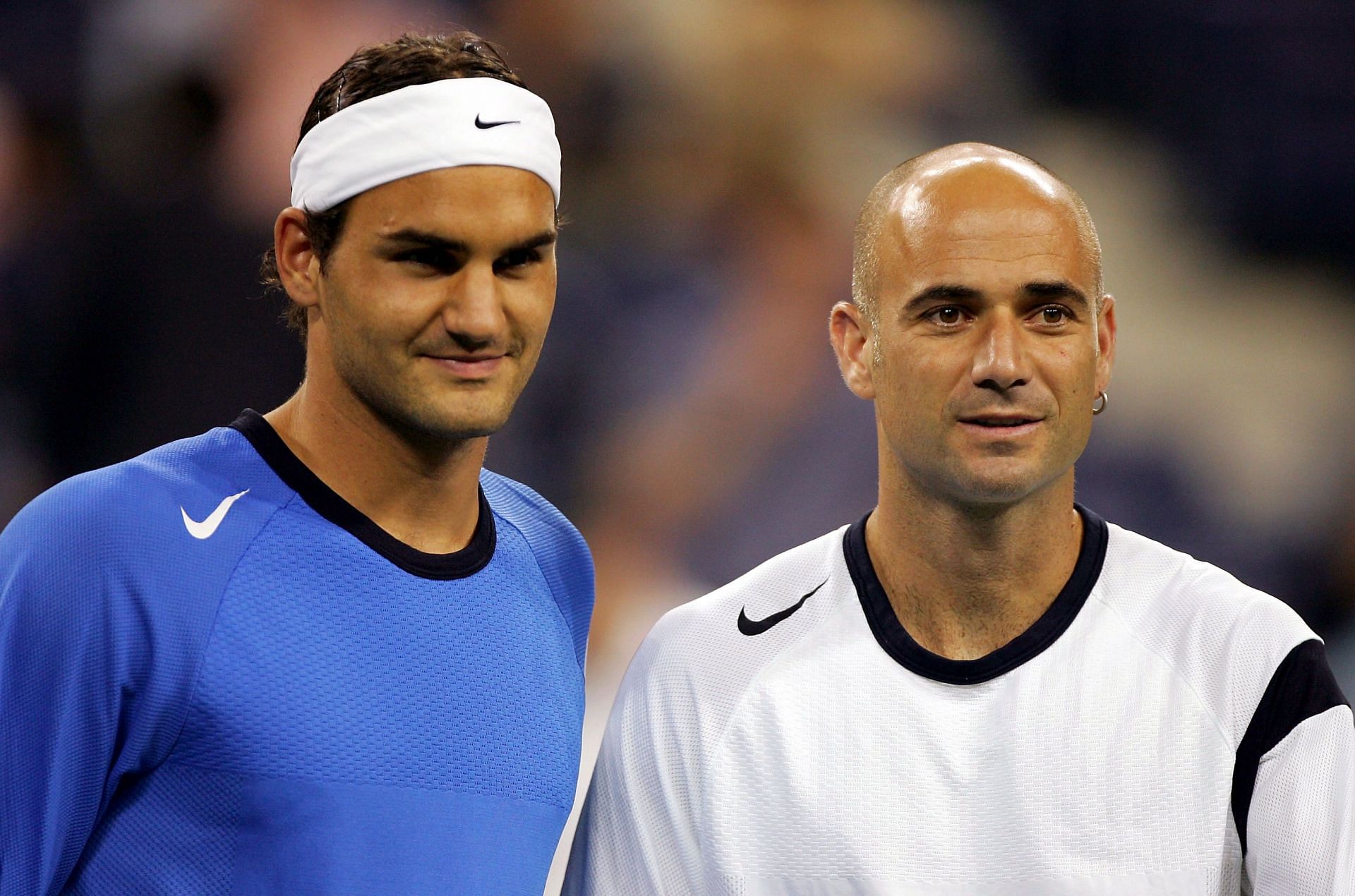 Roger Federer and Andre Agassi at the 2004 US Open.